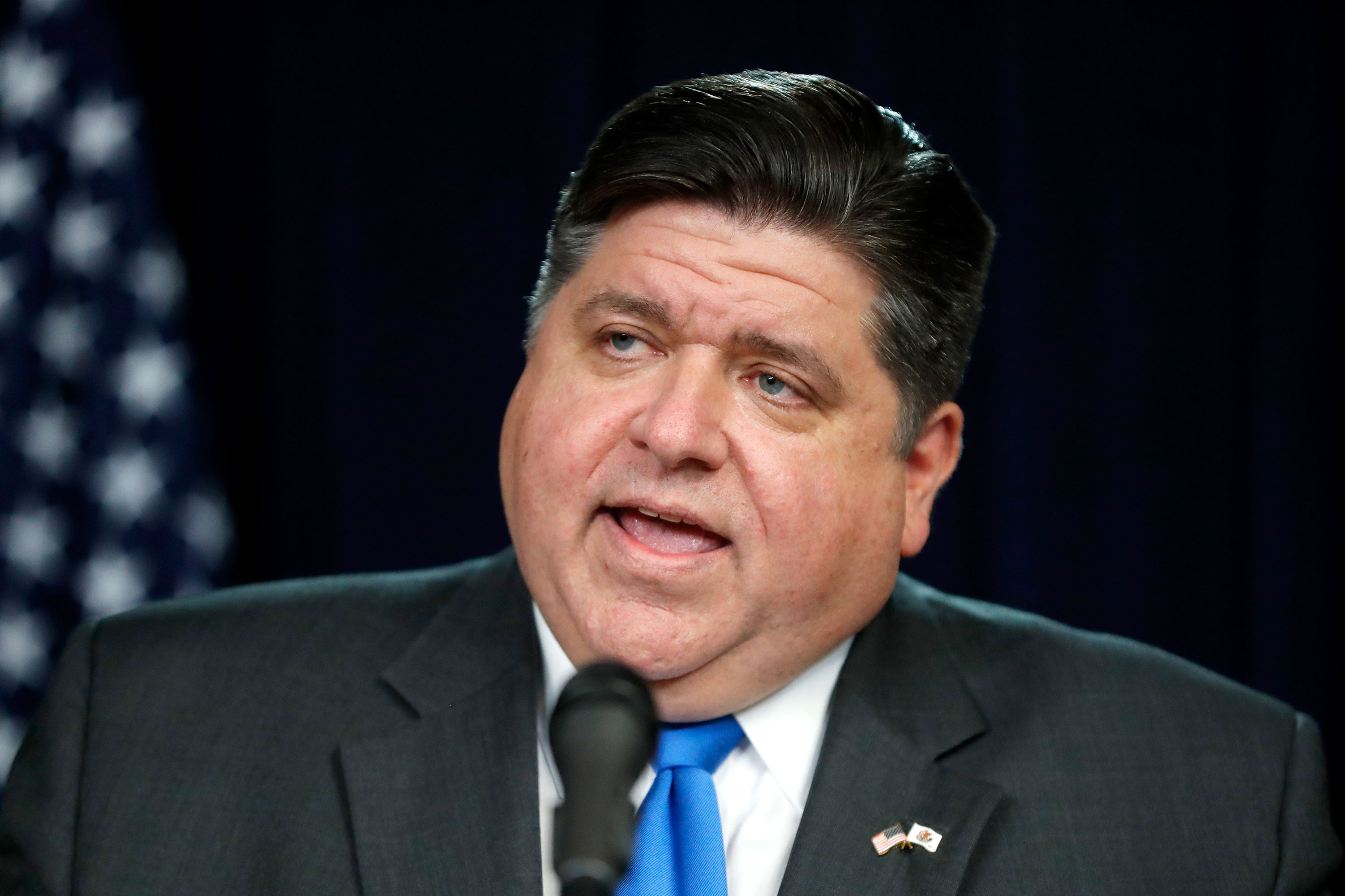 Illinois Gov. J.B. Pritzker speaks at a news conference on March 20 in Chicago. 