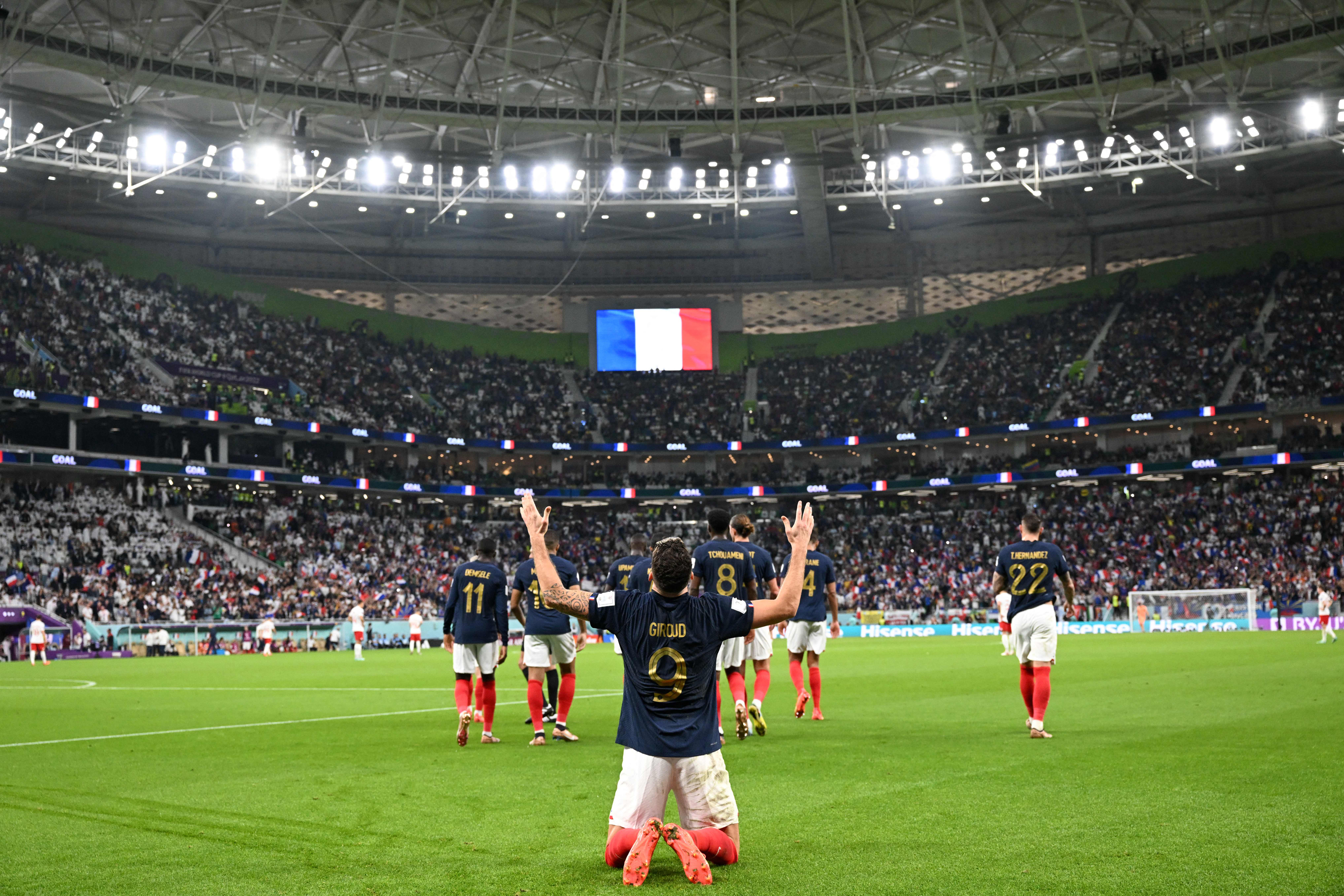 France's forward Olivier Giroud, celebrates scoring his team's first goal against Poland at the Al Thumama Stadium in Doha, Qatar on December 4.