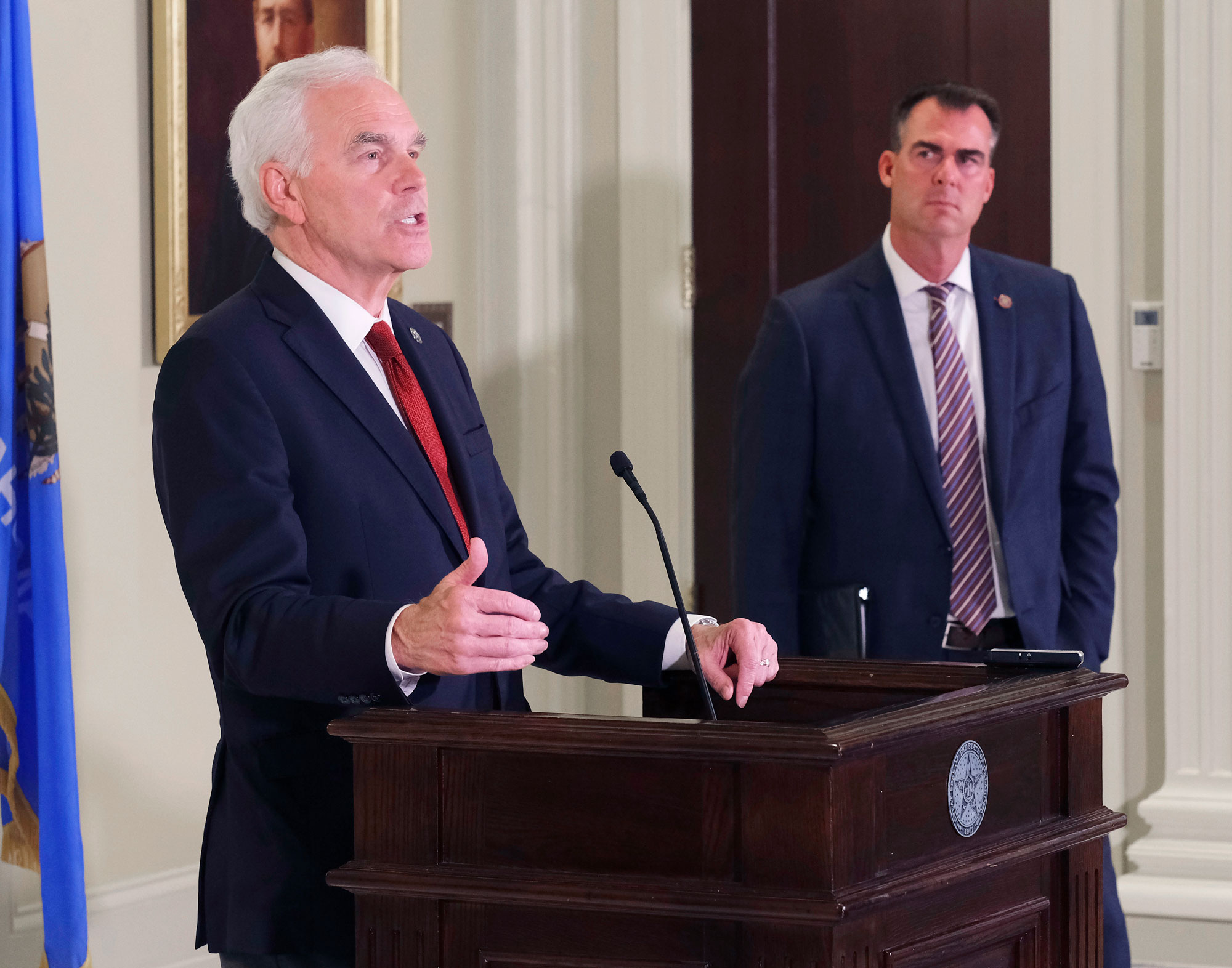 Oklahoma Attorney General John O'Connor, left, speaks as Governor Kevin Stitt looks on during a press conference at the Capitol in Oklahoma City, on Friday.
