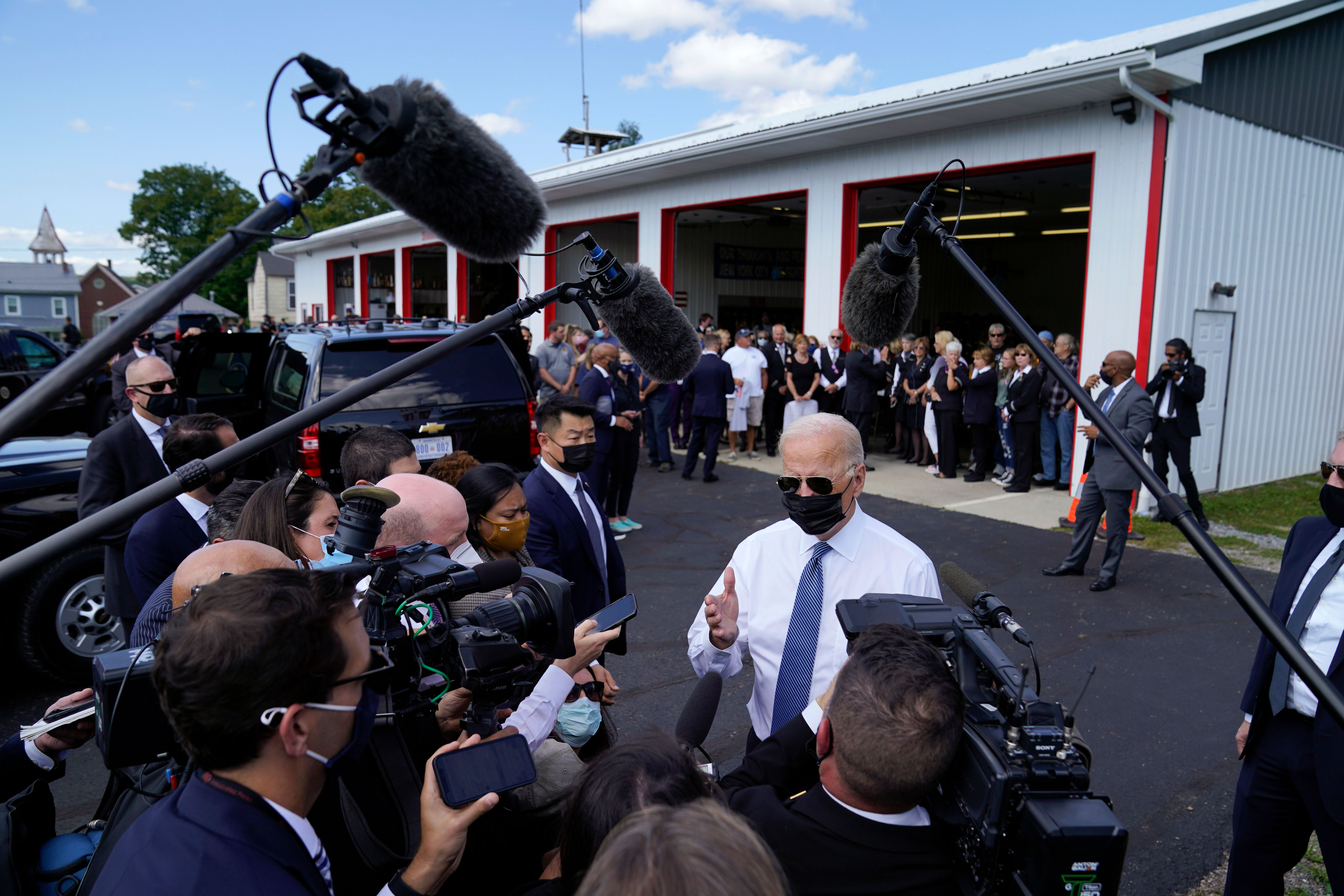 President Joe Biden speaks to members of the media as he visits the Shanksville Volunteer Fire Department in Shanksville, Pennsylvania, on September 11.