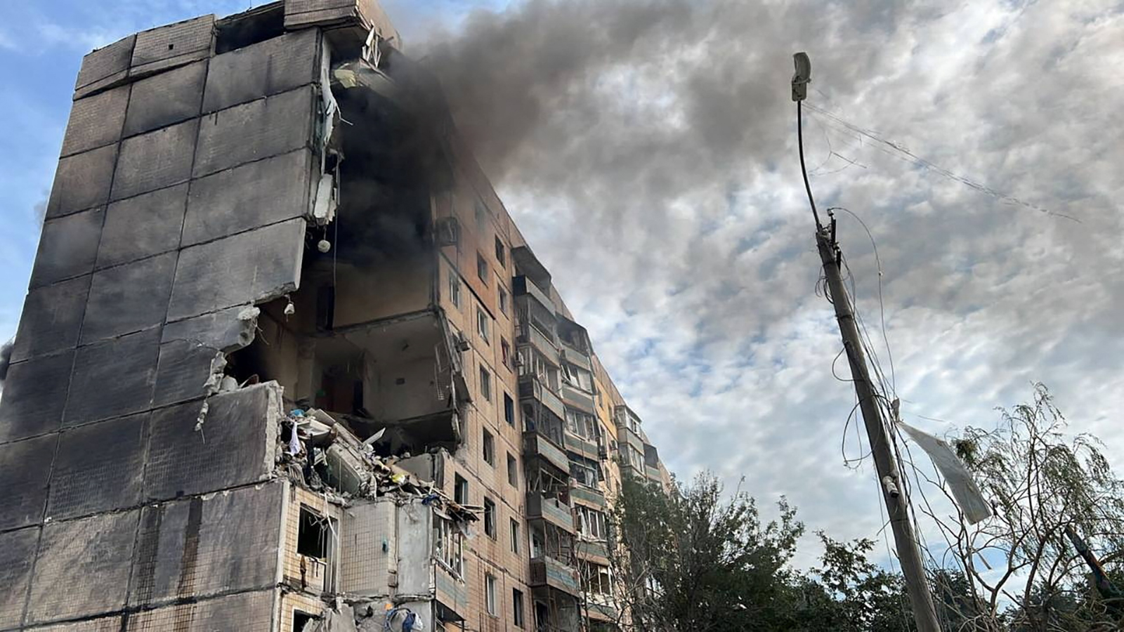 This picture shows an apartment building heavily damaged by a Russian missile strike in Kryvyi Rih, Ukraine on July 31.