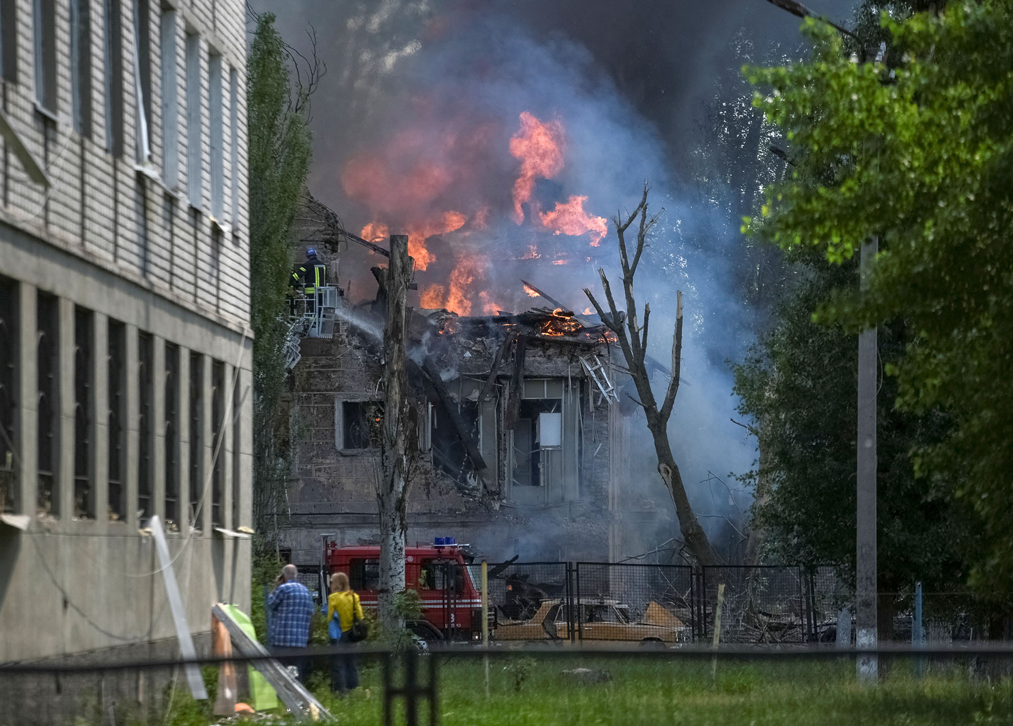 Emergency services attend to a clinic damaged by a Russian missile strike in Dnipro, Ukraine, on May 26.
