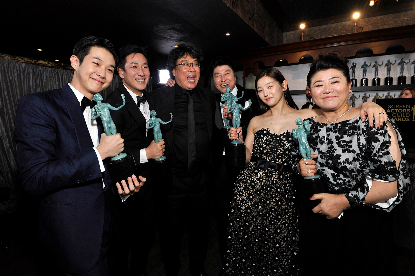 Choi Woo-shik, Lee Sun Gyun, Bong Joon-ho, Song Kang Ho, Park So-dam, and Jeong-eun Lee winners of Outstanding Performance by a Cast in a Motion Picture for 'Parasite', pose in the trophy room during the 26th Annual Screen Actors Guild Awards at The Shrine Auditorium on January 19, 2020 in Los Angeles.