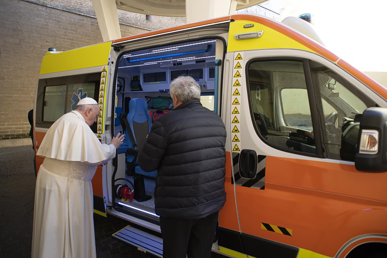 Pope Francis blesses an ambulance en route to Lviv, Ukraine.
