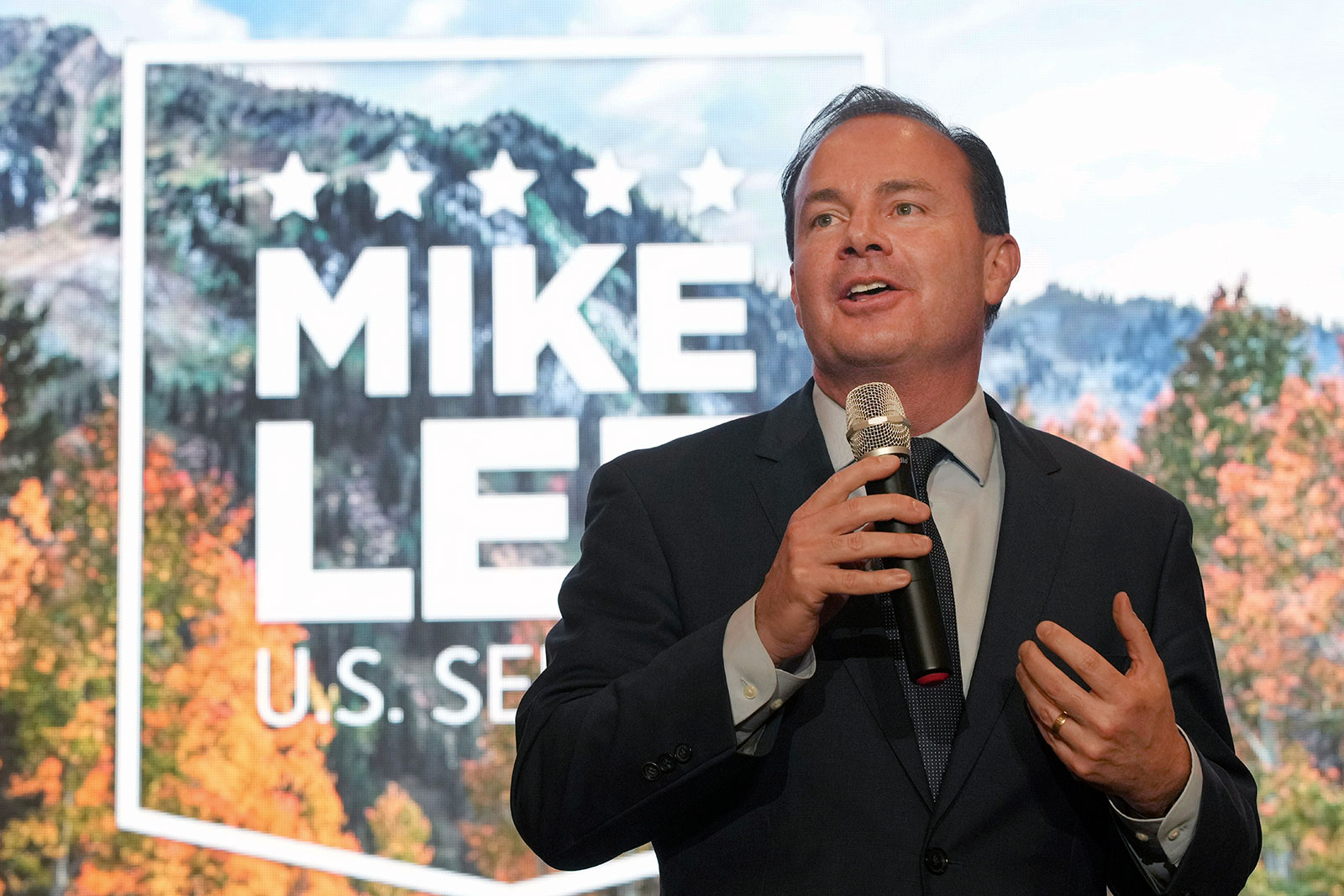 Sen. Mike Lee talks to supporters during an election night party on June 28 in South Jordan, Utah.