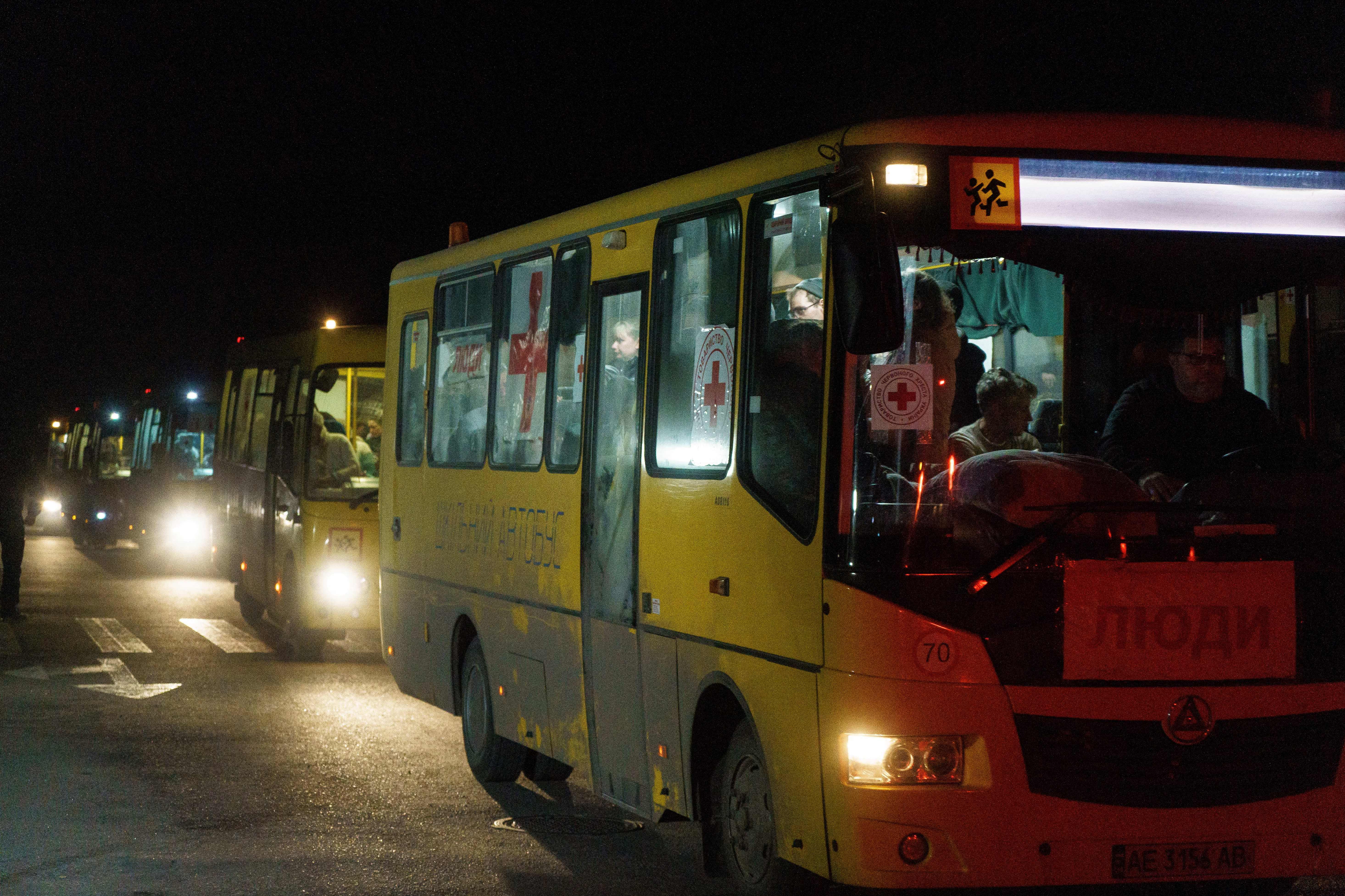 A convoy of 30 buses carrying evacuees from Mariupol and Melitopol arrive at the registration center in Zaporizhzhia, Ukraine, on April 1.