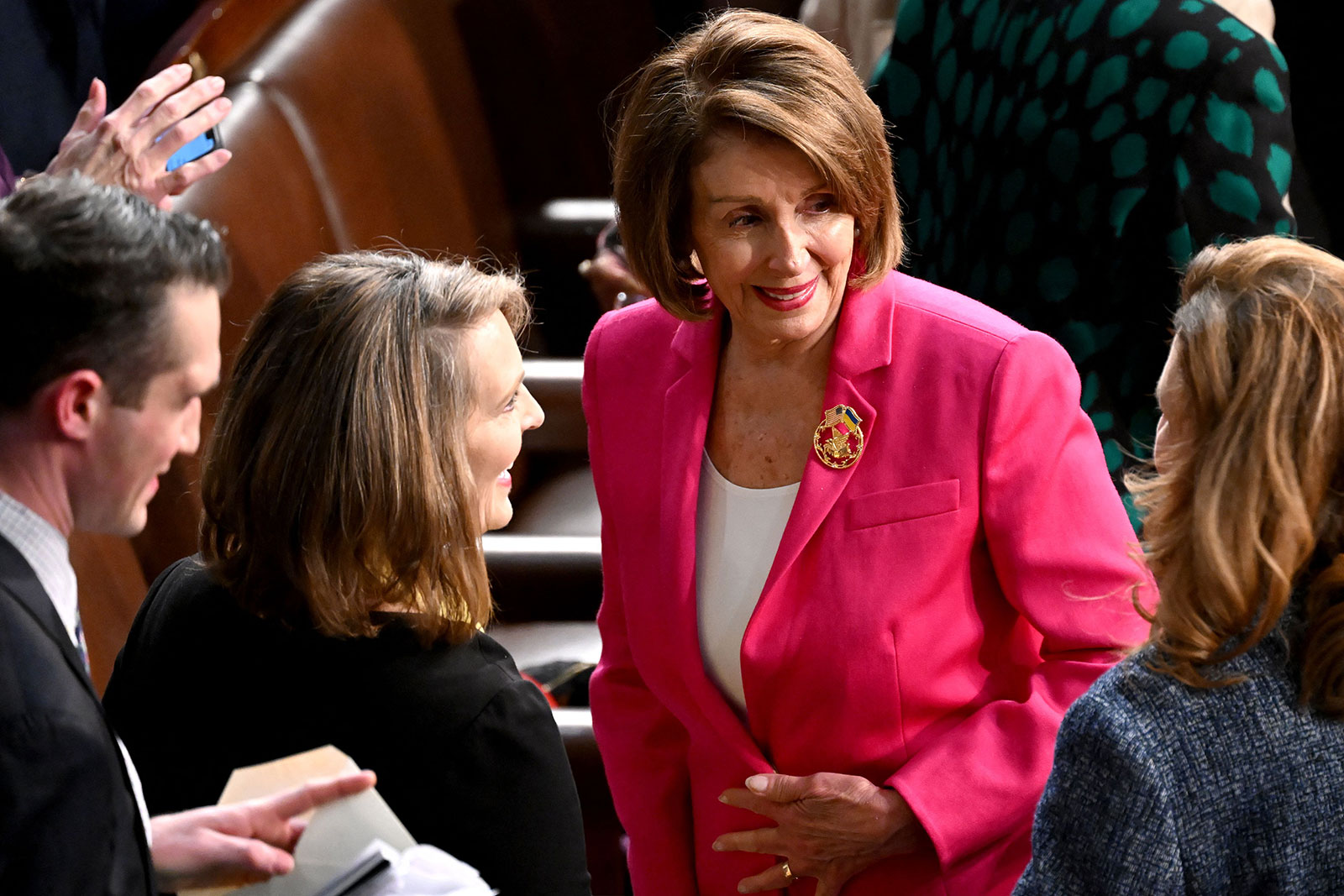 Former House Speaker Nancy Pelosi arrives in the House Chamber.