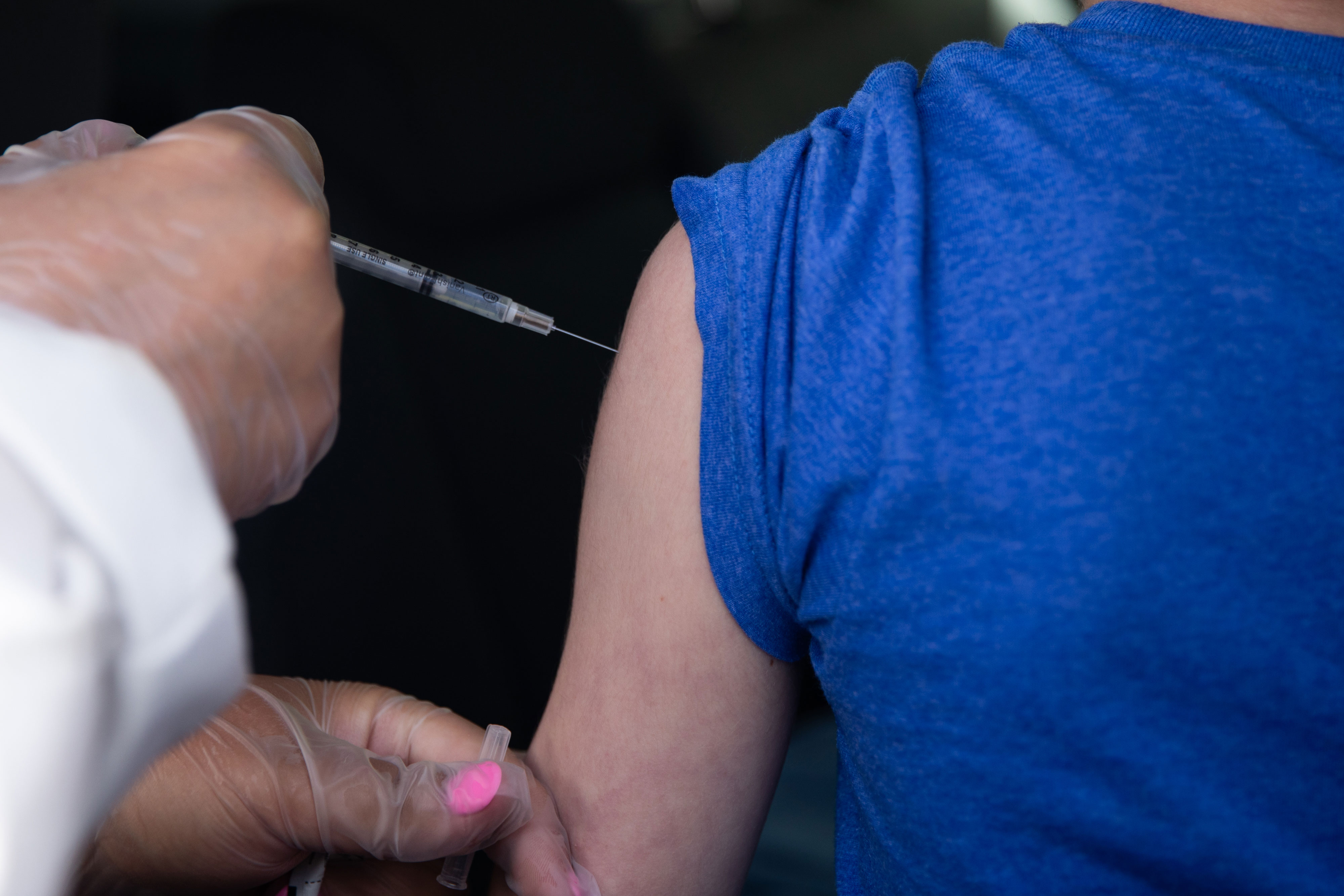A child receives a dose of a Covid-19 vaccine in Farmington Hills, Michigan, on May 13.