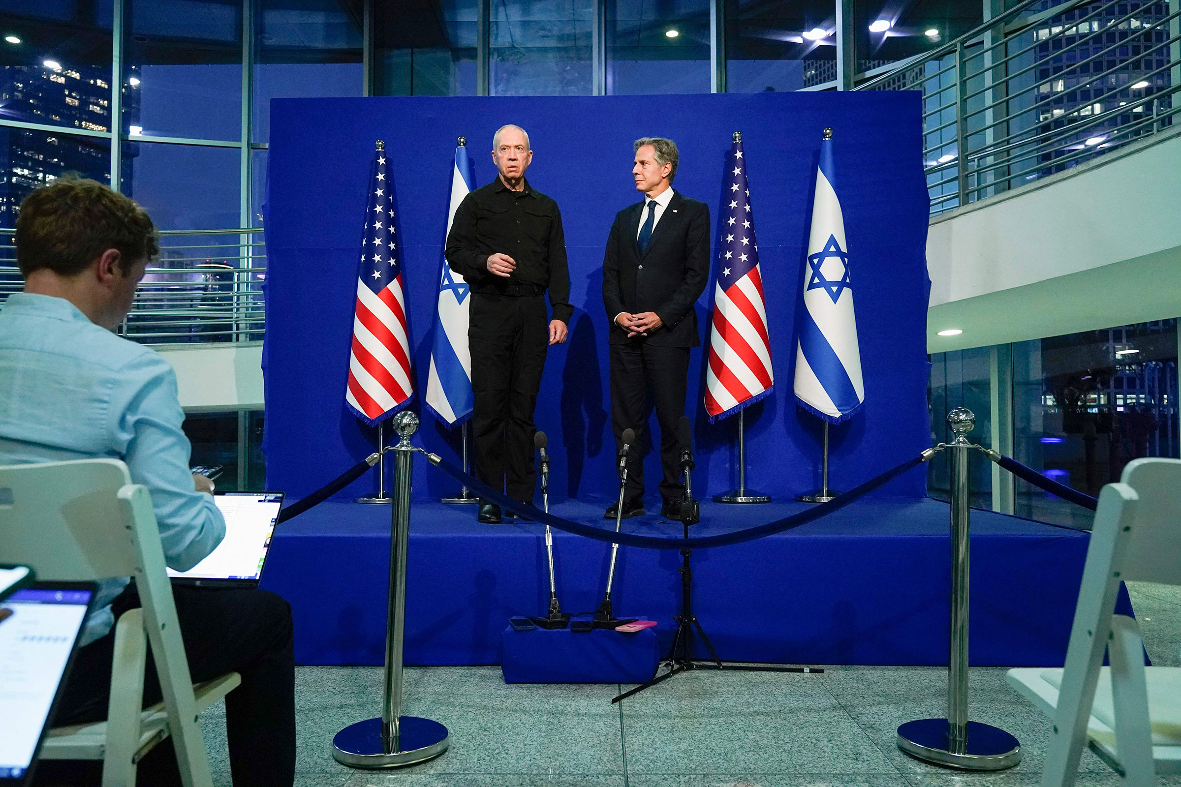 Secretary of State Antony Blinken, right, and Israel's Defense Minister Yoav Gallant make brief statements to the media at the Israeli Ministry of Defense in Tel Aviv on Monday.