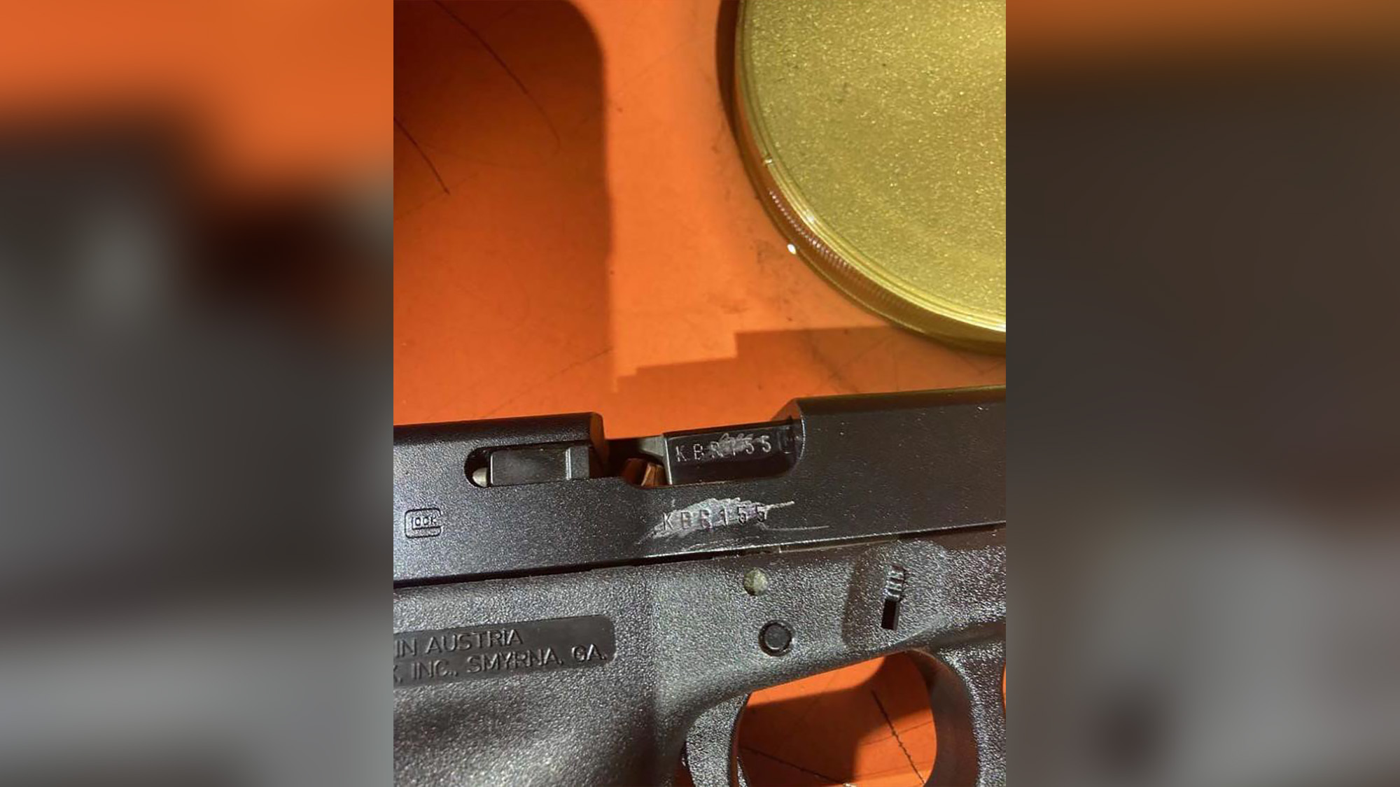 An image of the Glock 17 found at the scene had scratch marks on its serial number. 