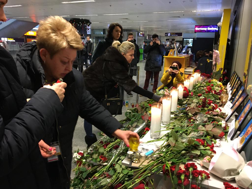 Mourners light candles at a memorial for the crash victims at Ukraine's Boryspil International Airport on Thursday.