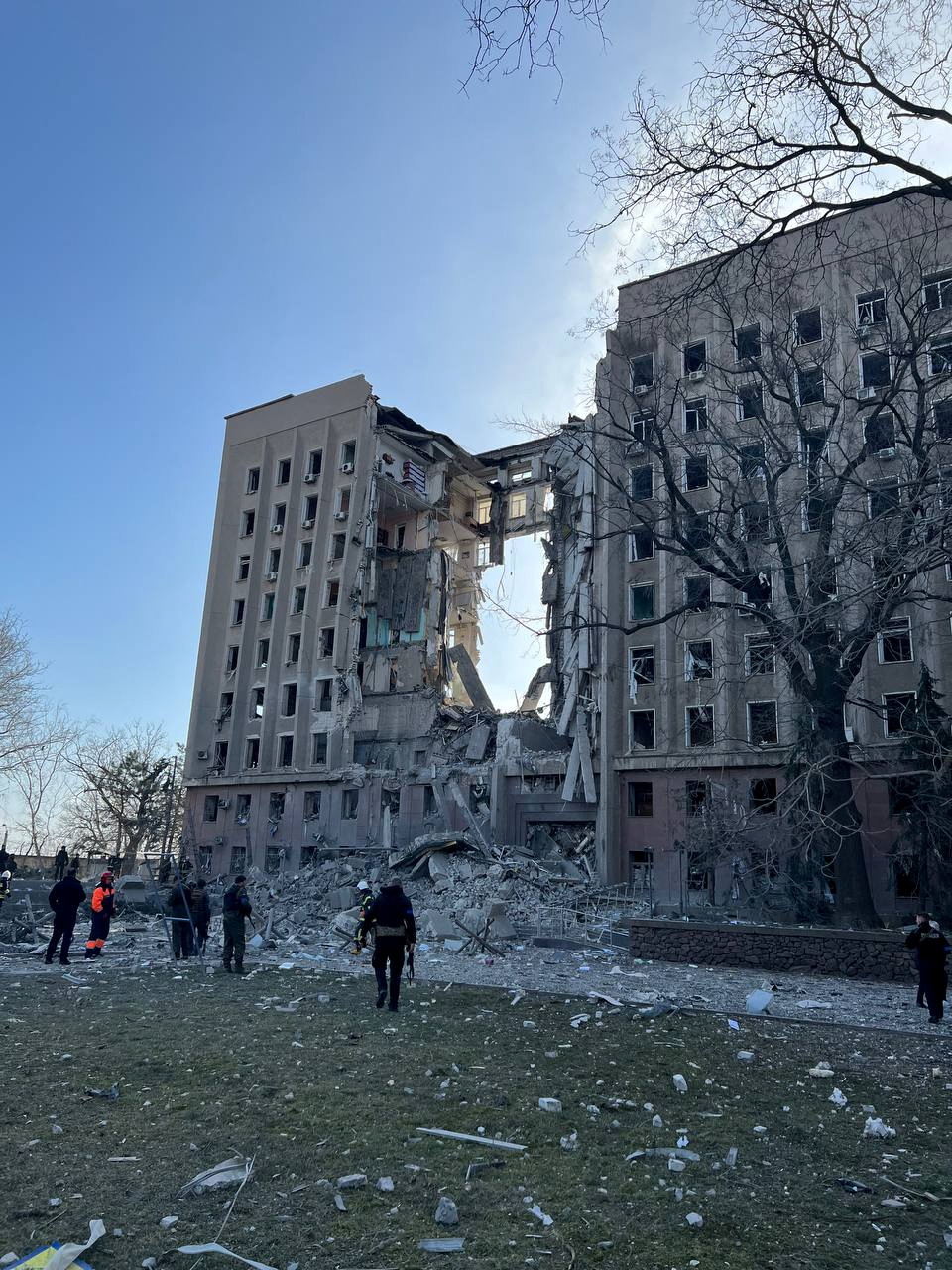 First responders are seen at the site of the Mykolaiv Regional State Administration building in Mykolaiv, Ukraine, on March 29.