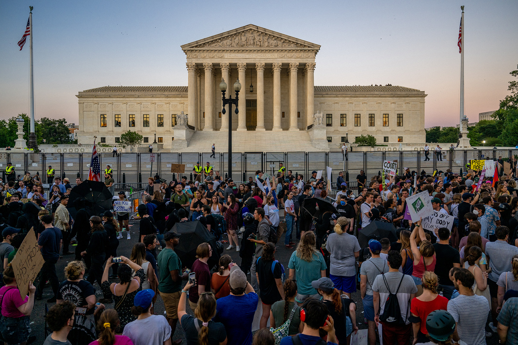People protest in front of the U.S. Supreme Courthouse on June 24, in Washington, DC. 