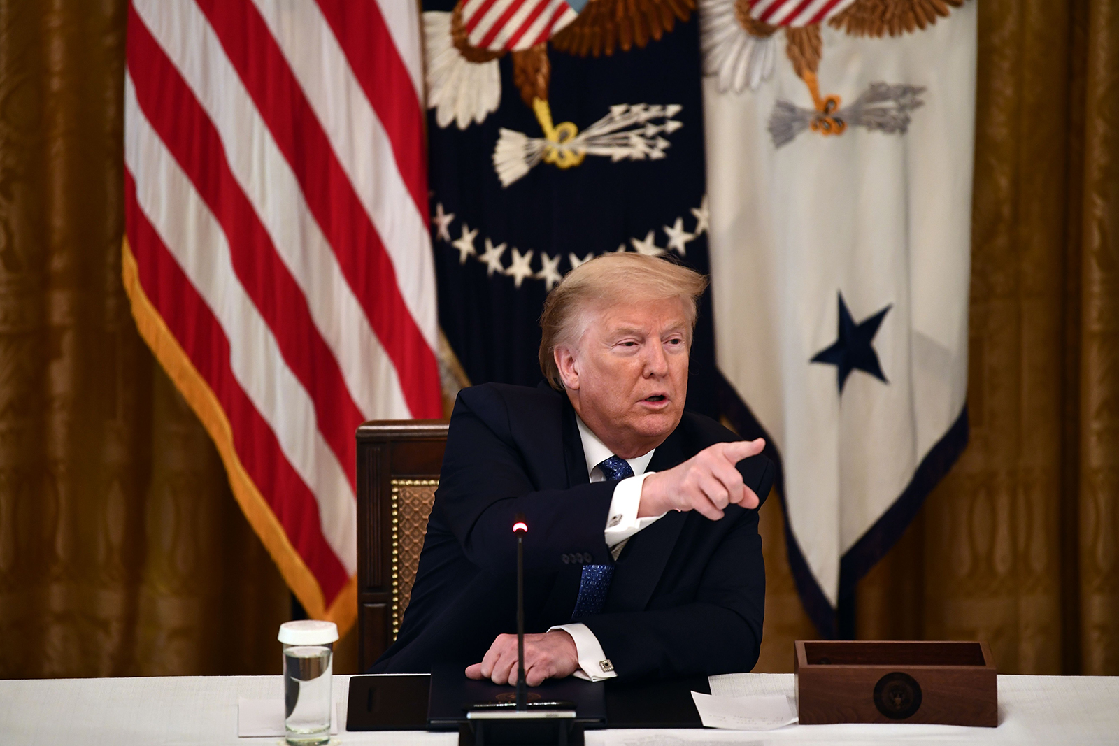 President Donald Trump speaks during a meeting with his cabinet on Tuesday, May 19, in Washington.