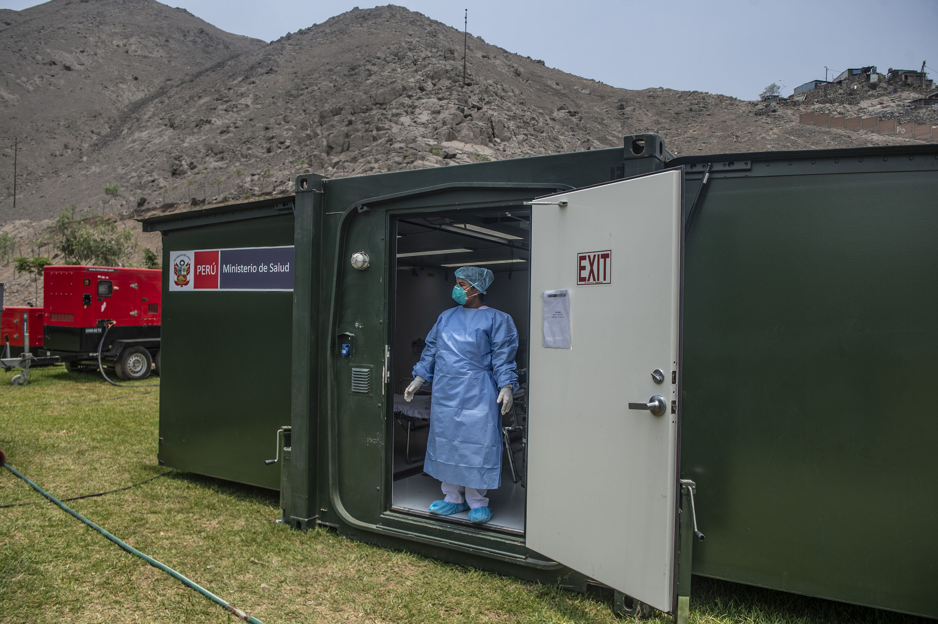 A specialist stands in a mobile unit set up by the Peruvian Ministry of Health at the Hipolito Unanue Hospital in Lima, Peru, on February 27. 