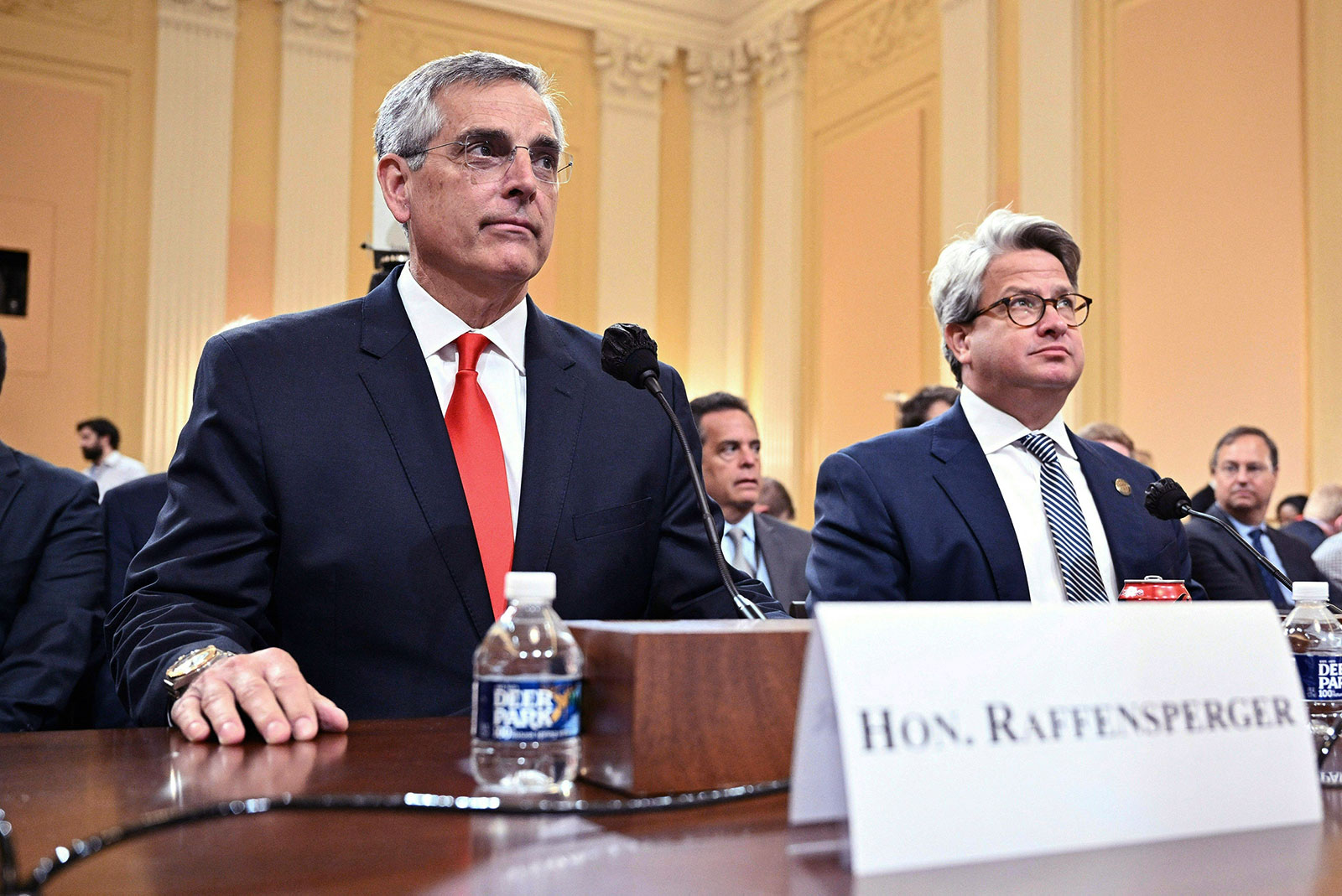 Georgia Secretary of State Brad Raffensperger, left, and his chief operating officer, Gabriel Sterling, arrive Tuesday, June 21, to testify before the the House select committee.