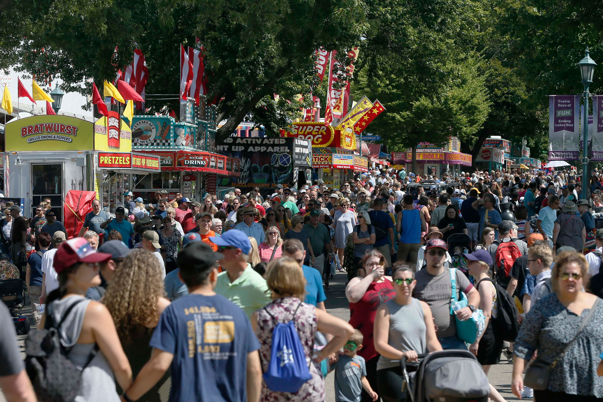 Thousands packed the fairgrounds as the 12-day Minnesota State Fair gets underway on Aug. 22, 2019, in Falcon Heights, Minnesota.