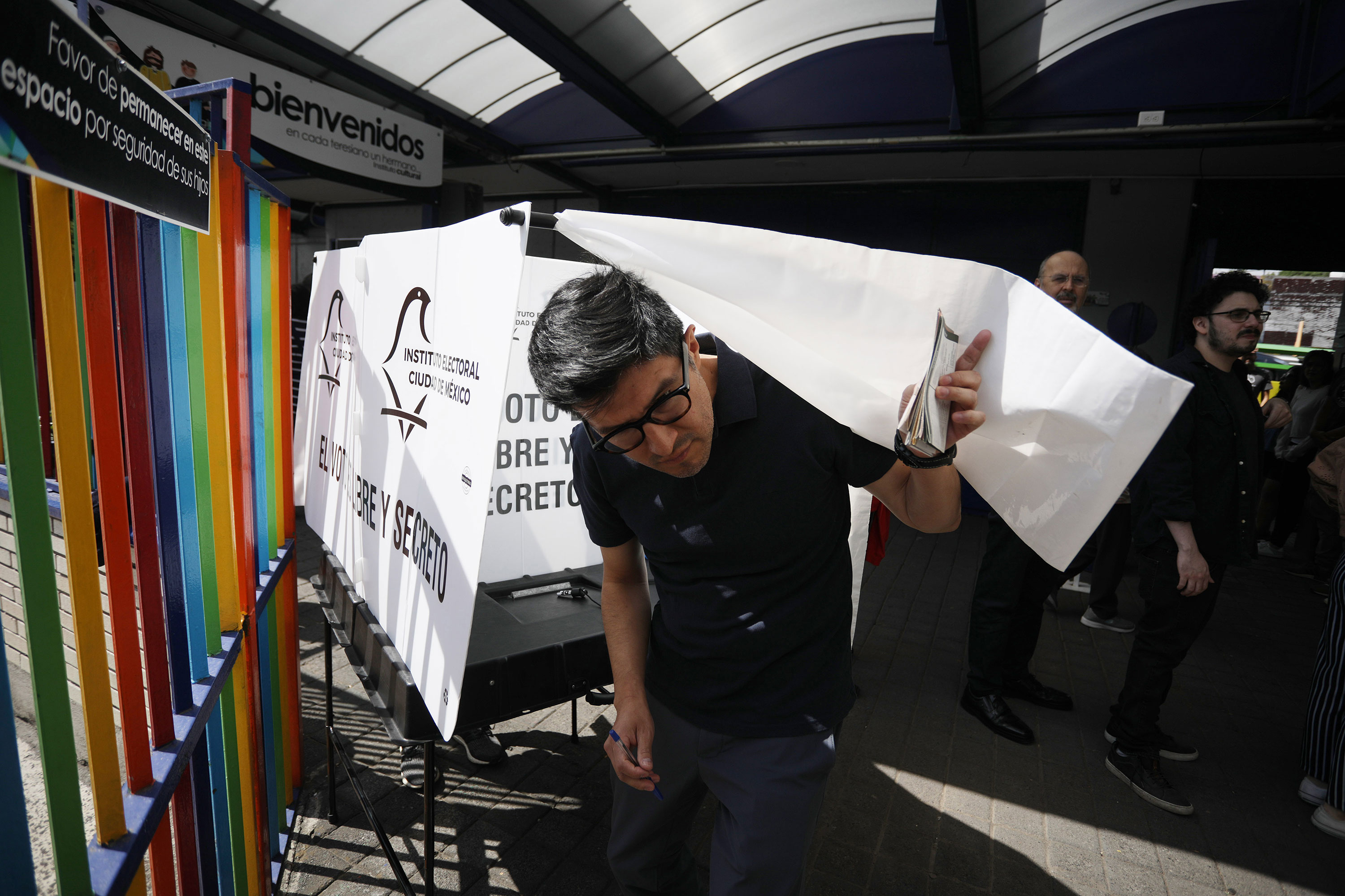 A man casts his ballot at a polling station in Mexico City on Sunday. 