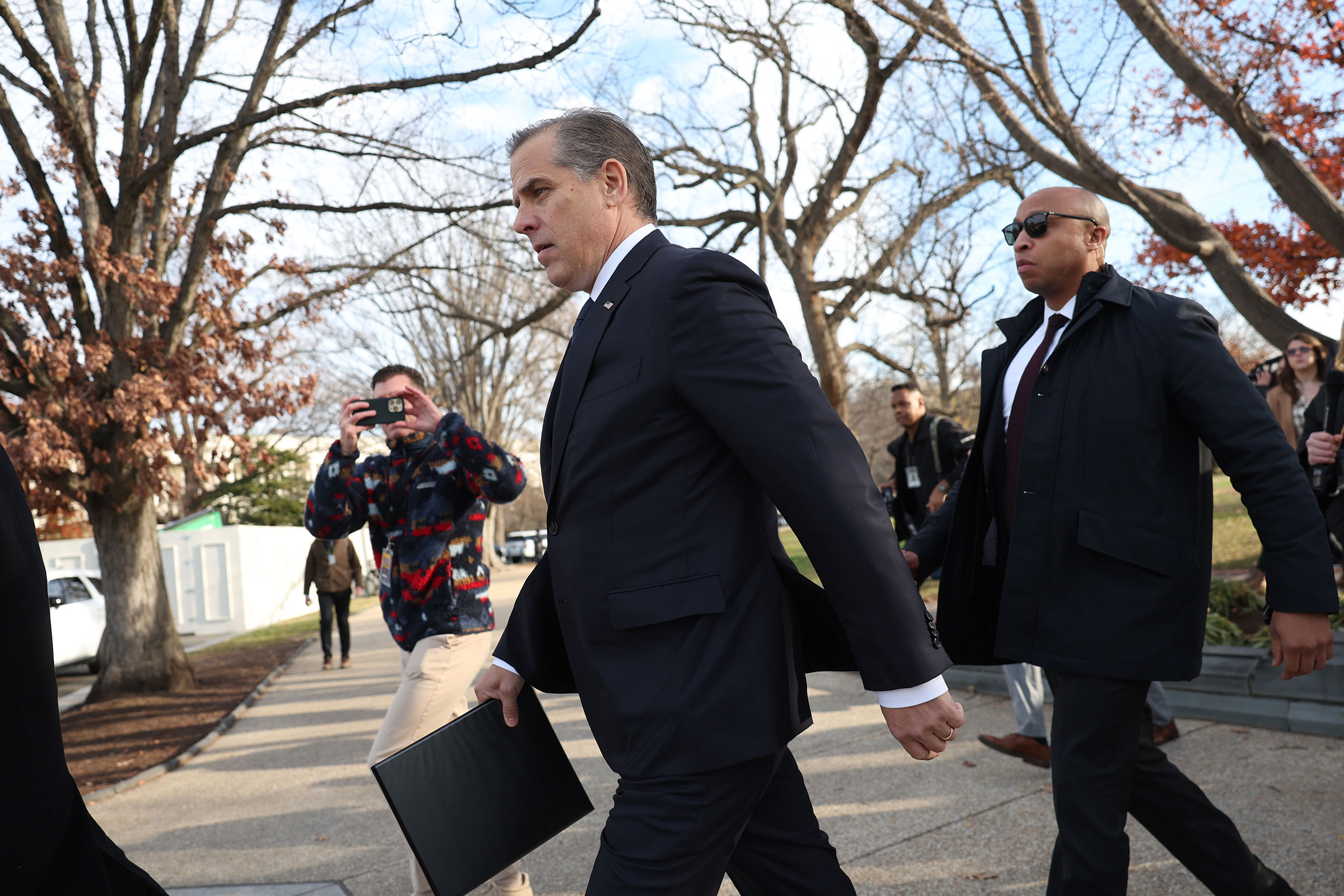 President Joe Biden's son Hunter Biden walks away after addressing reporters outside the US Capitol on December 13, in Washington, DC. 