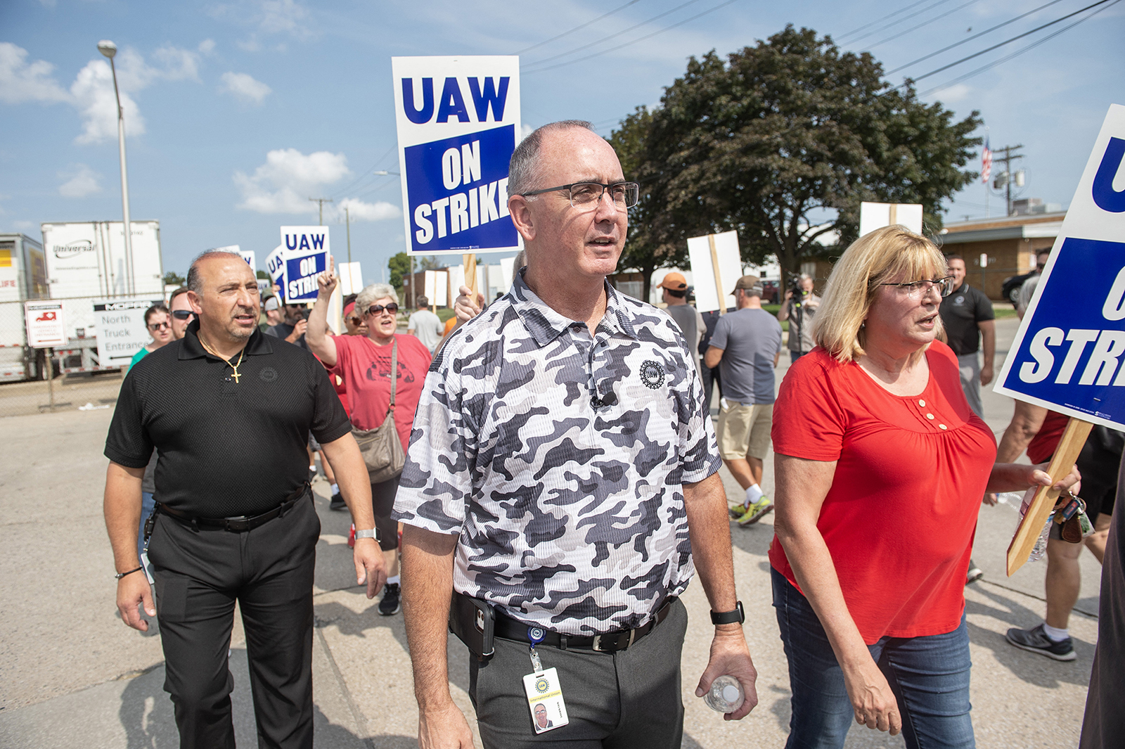 UAW president Shawn Fain and members and workers at the Mopar Parts Center Line, a Stellantis Parts Distribution Center in Center Line, Michigan, picket outside the facility after walking off their jobs at noon on September 22.