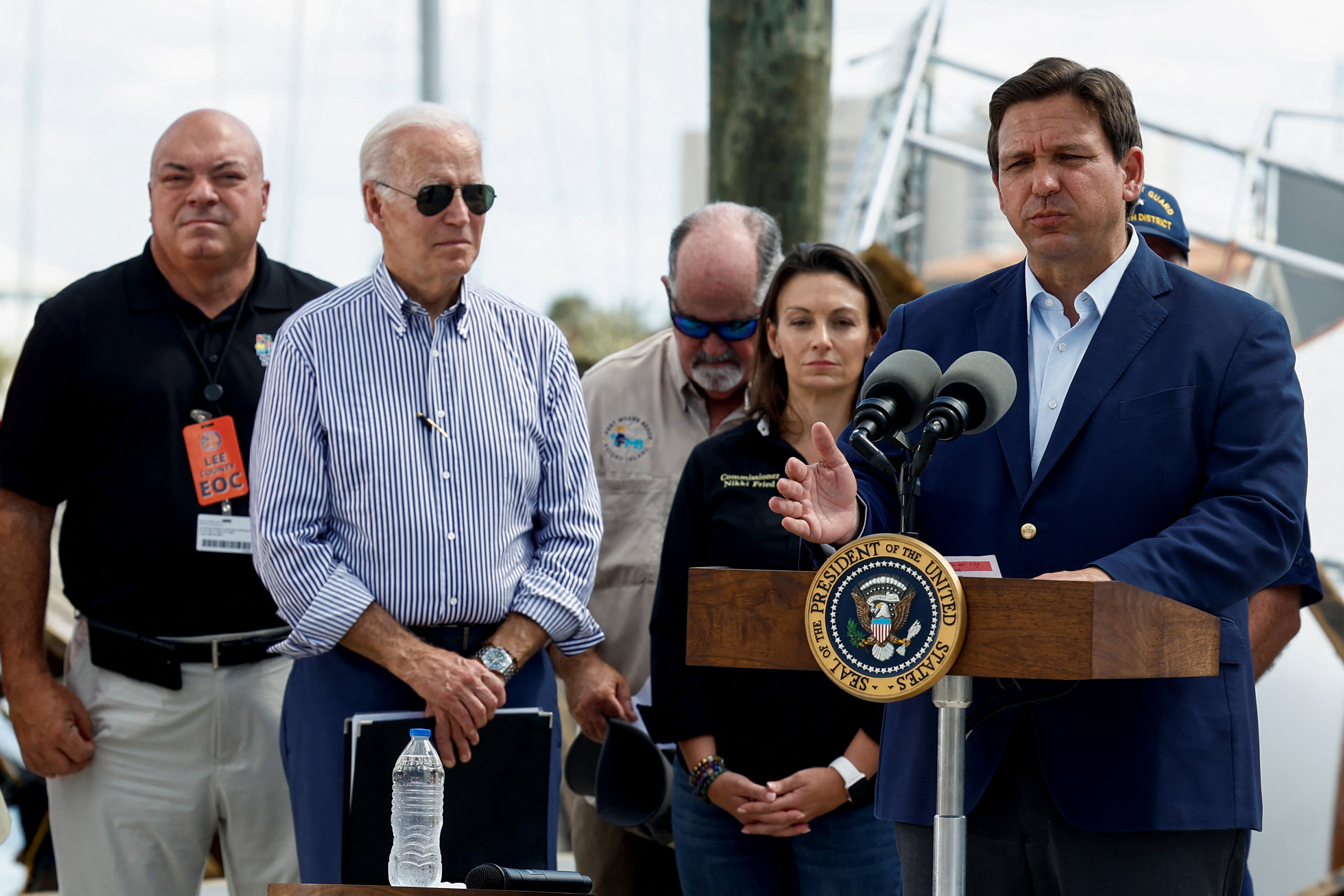 Florida Governor Ron DeSantis speaks as President Biden visits Fisherman's Wharf while touring areas damaged by Hurricane Ian, in Fort Myers, Florida, on October 5.