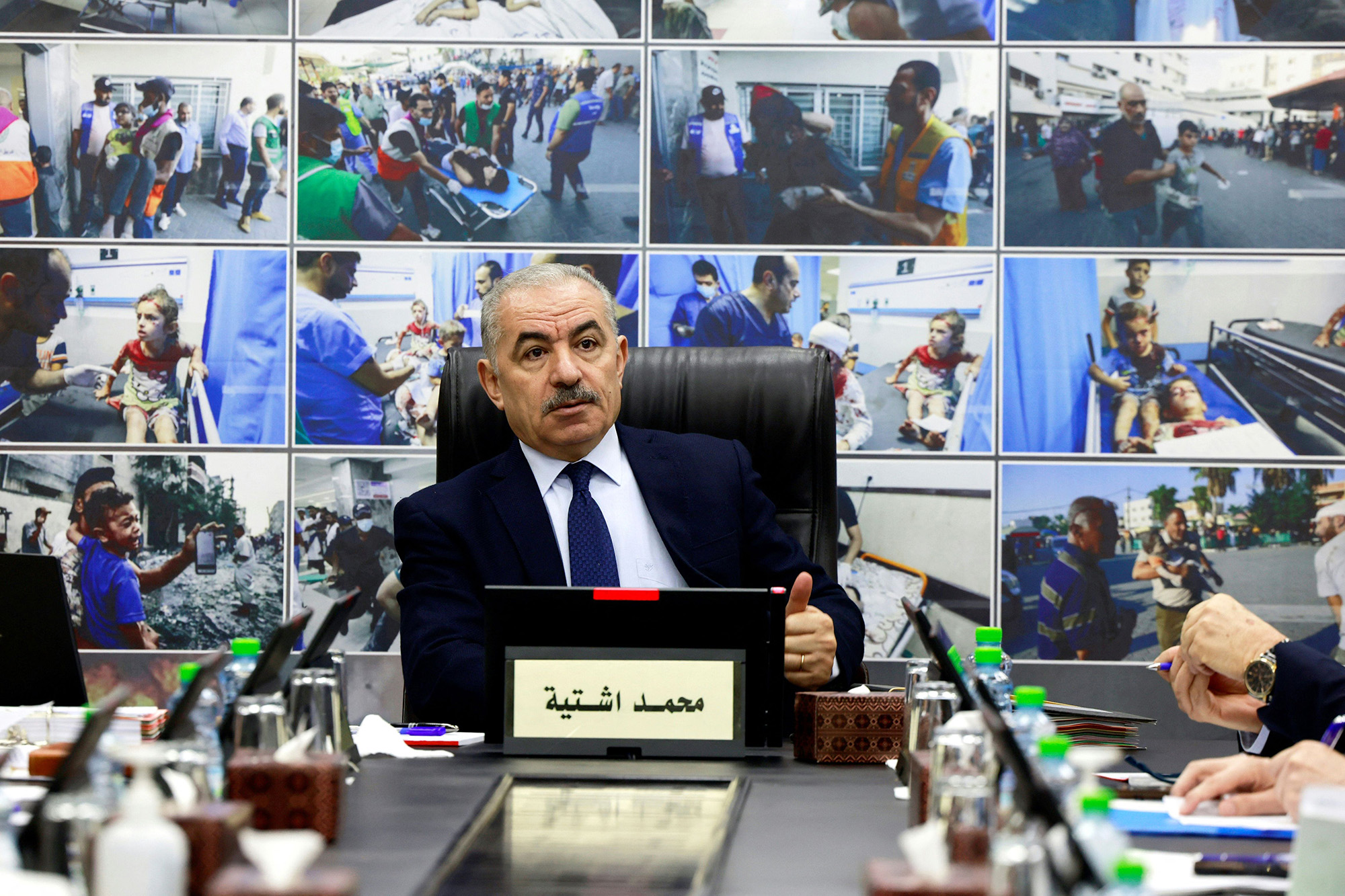 Palestinian prime minister Mohammad Shtayyeh attends during a cabinet meeting in the West Bank city of Ramallah on October 16.