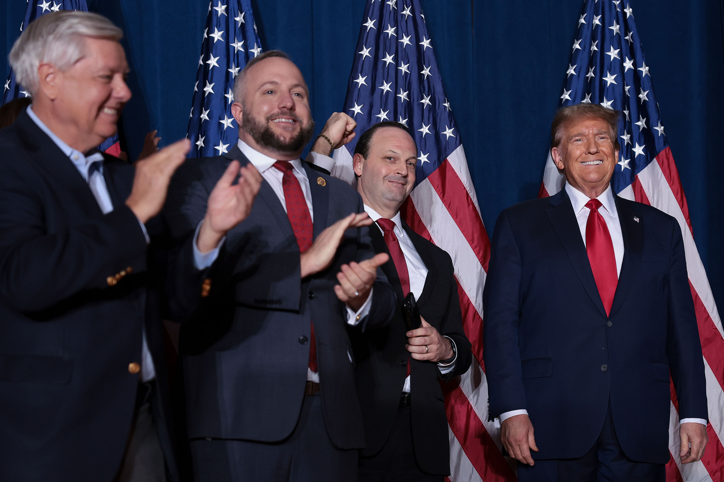 Former President Donald Trump arrives on stage to speak to supporters during an election night watch party at the State Fairgrounds on February 24 in Columbia, South Carolina. 