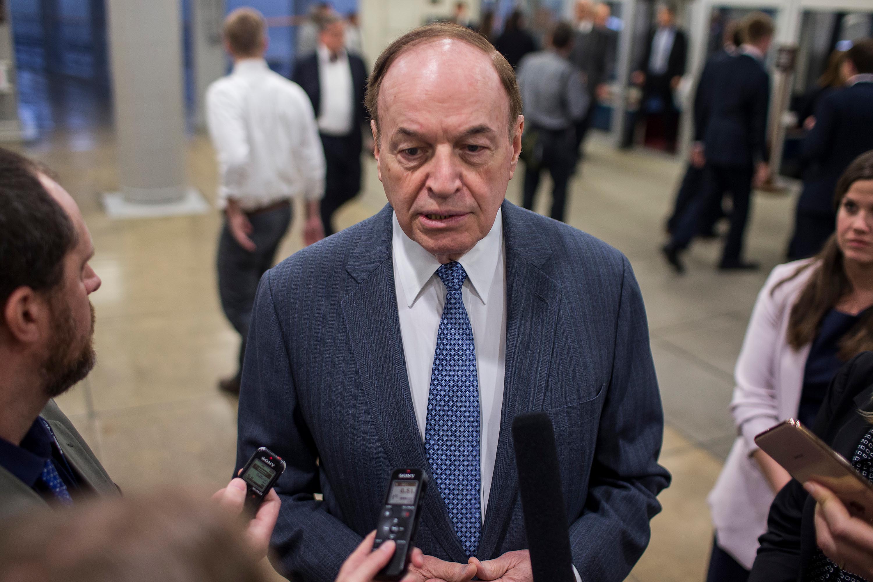 Sen. Richard Shelby speaks to reporters in the Senate basement before a weekly policy luncheon in April 2019.