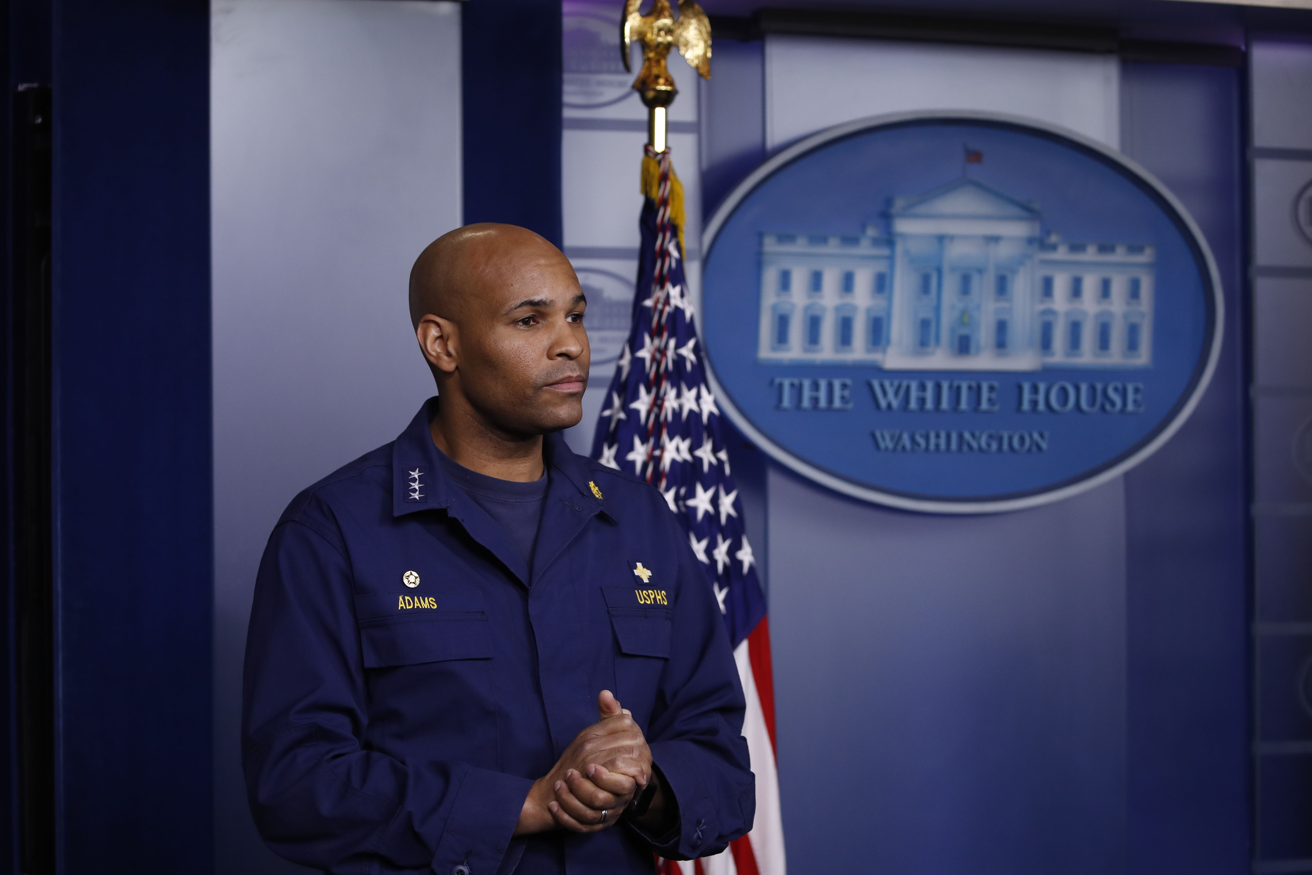 US Surgeon General Dr. Jerome Adams listens during a briefing at the White House on April 22.