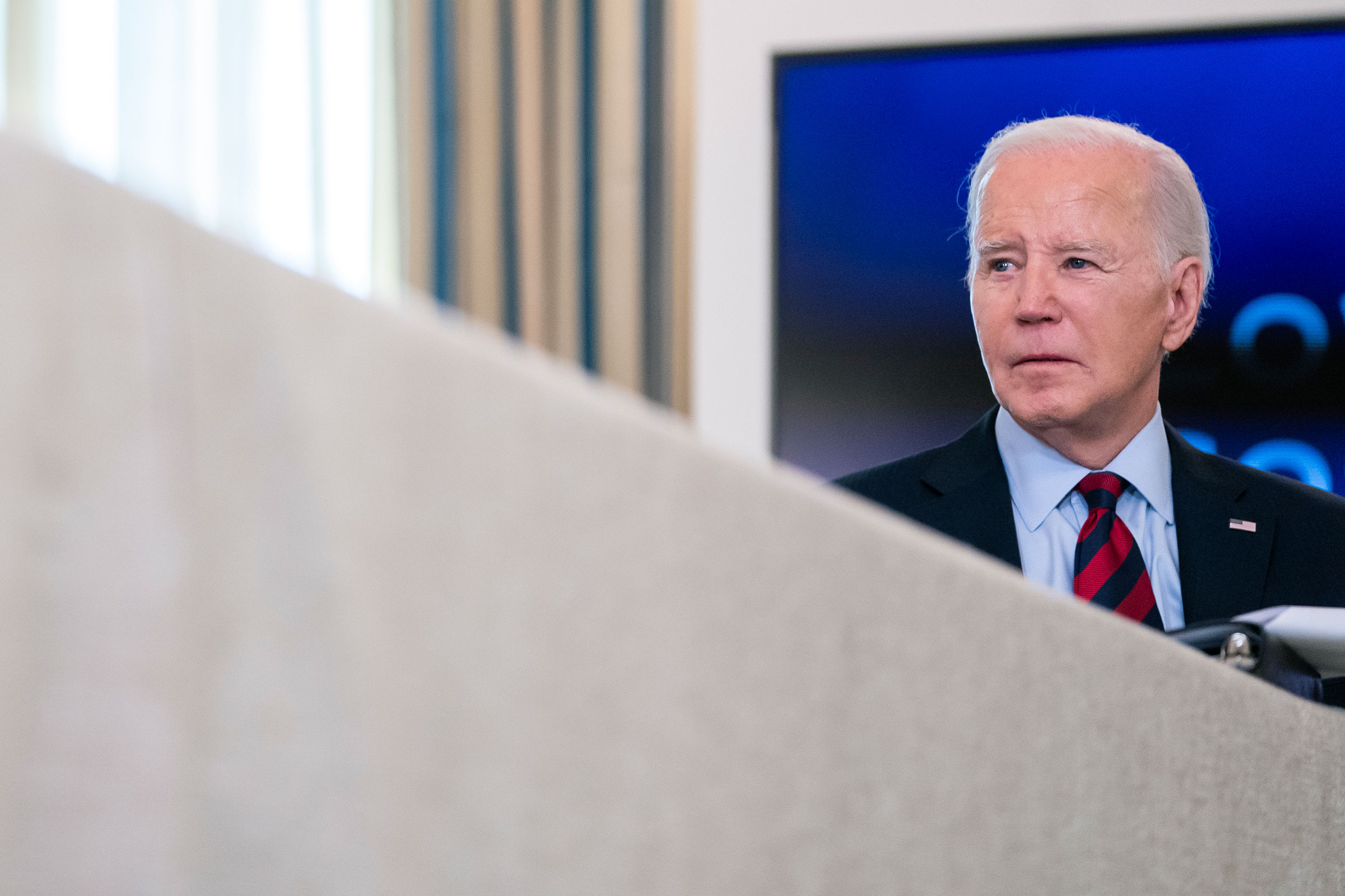President Joe Biden listens to remarks during a meeting with his Competition Council in the State Dining Room of the White House on March 5 in Washington, DC. 