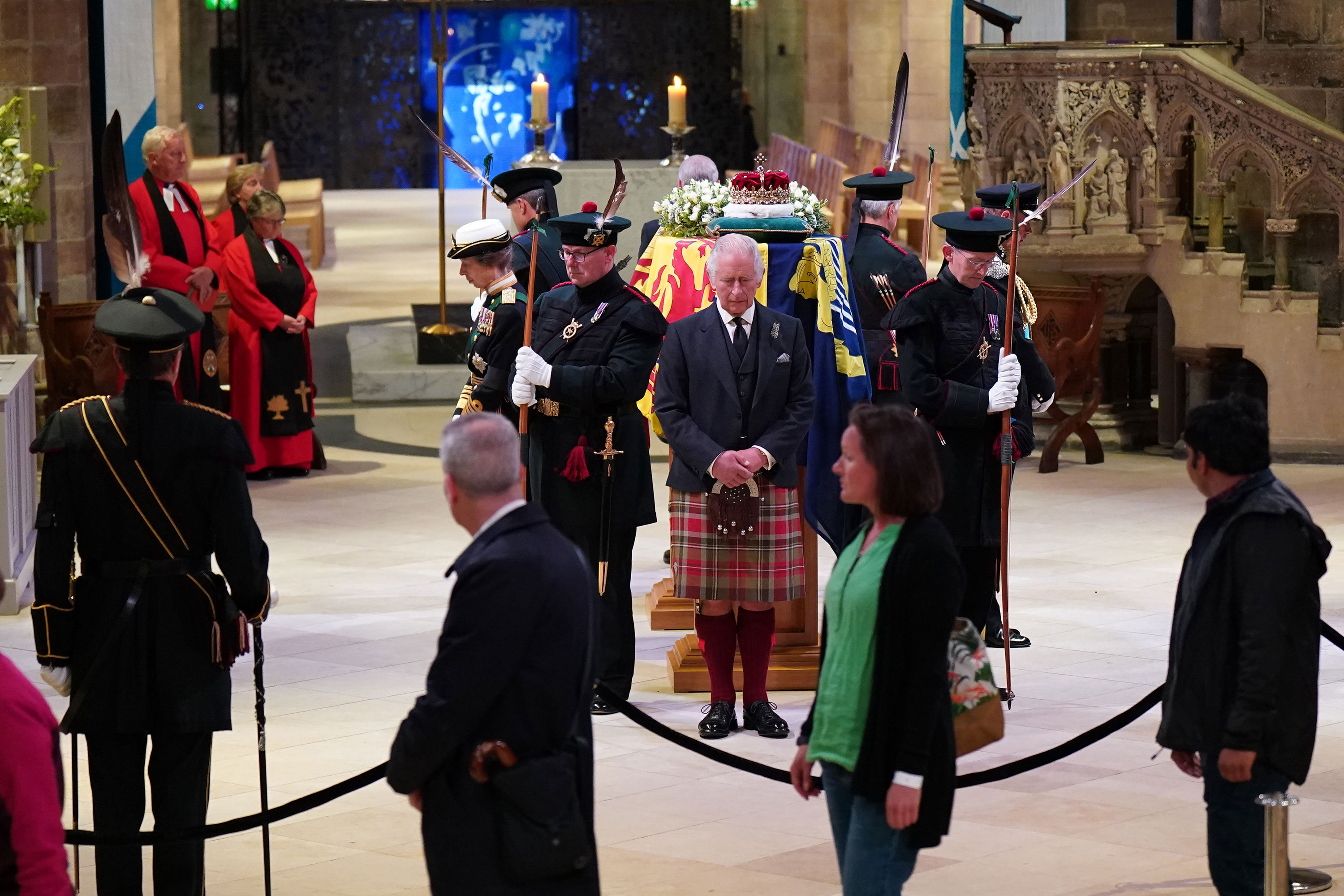 King Charles III holds vigil by the Queen's coffin alongside his siblings Princess Anne, Prince Edward and Prince Andrew at St. Giles' Cathedral in Edinburgh, Scotland, on Monday.