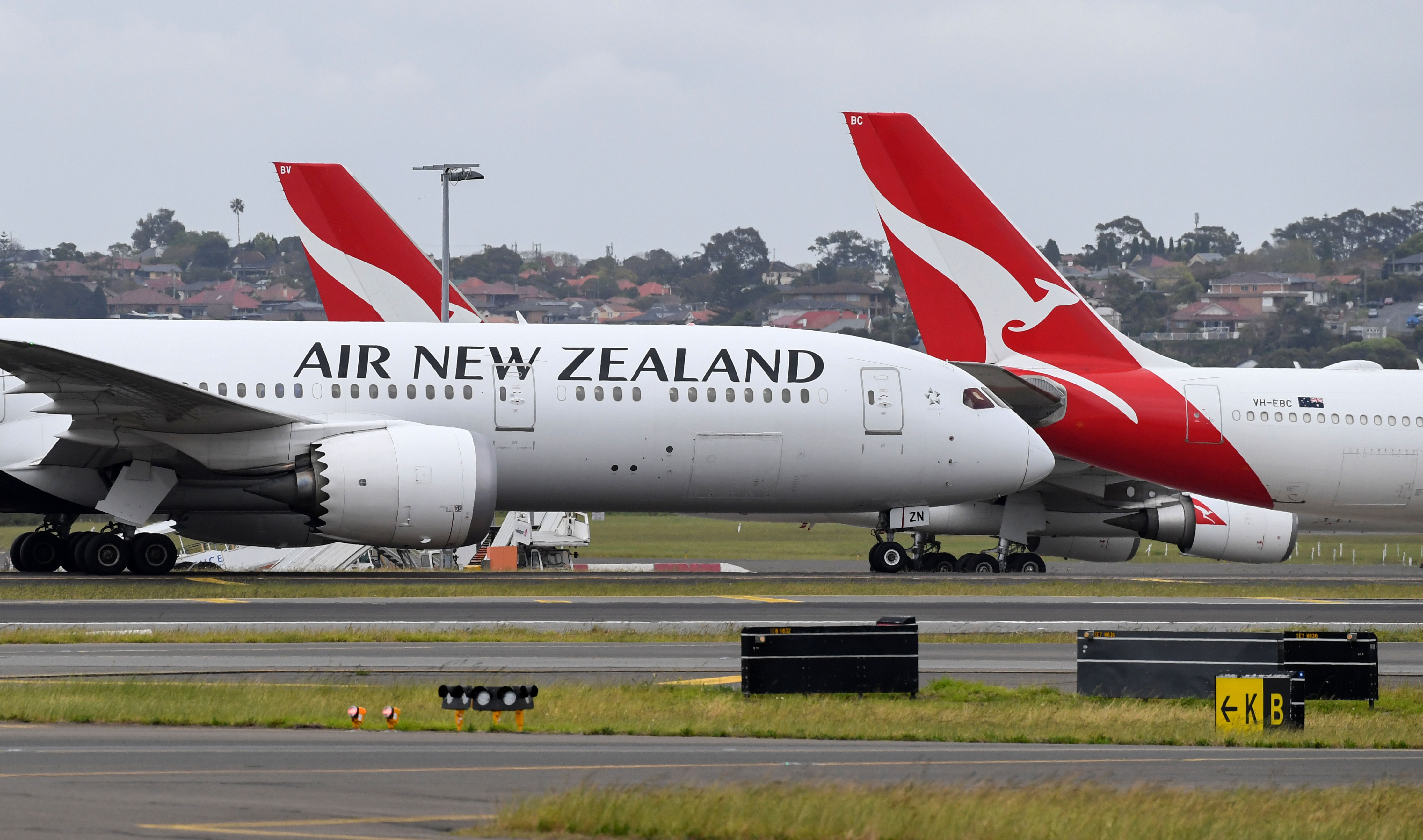 An Air New Zealand flight taxis after it landed at Sydney International Airport in Australia on September 18.