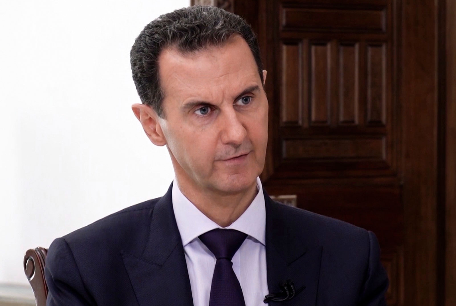 Syrian President Bashar al-Assad speaks during an interview with RIA Novosti on October 6 in Damascus, Syria.