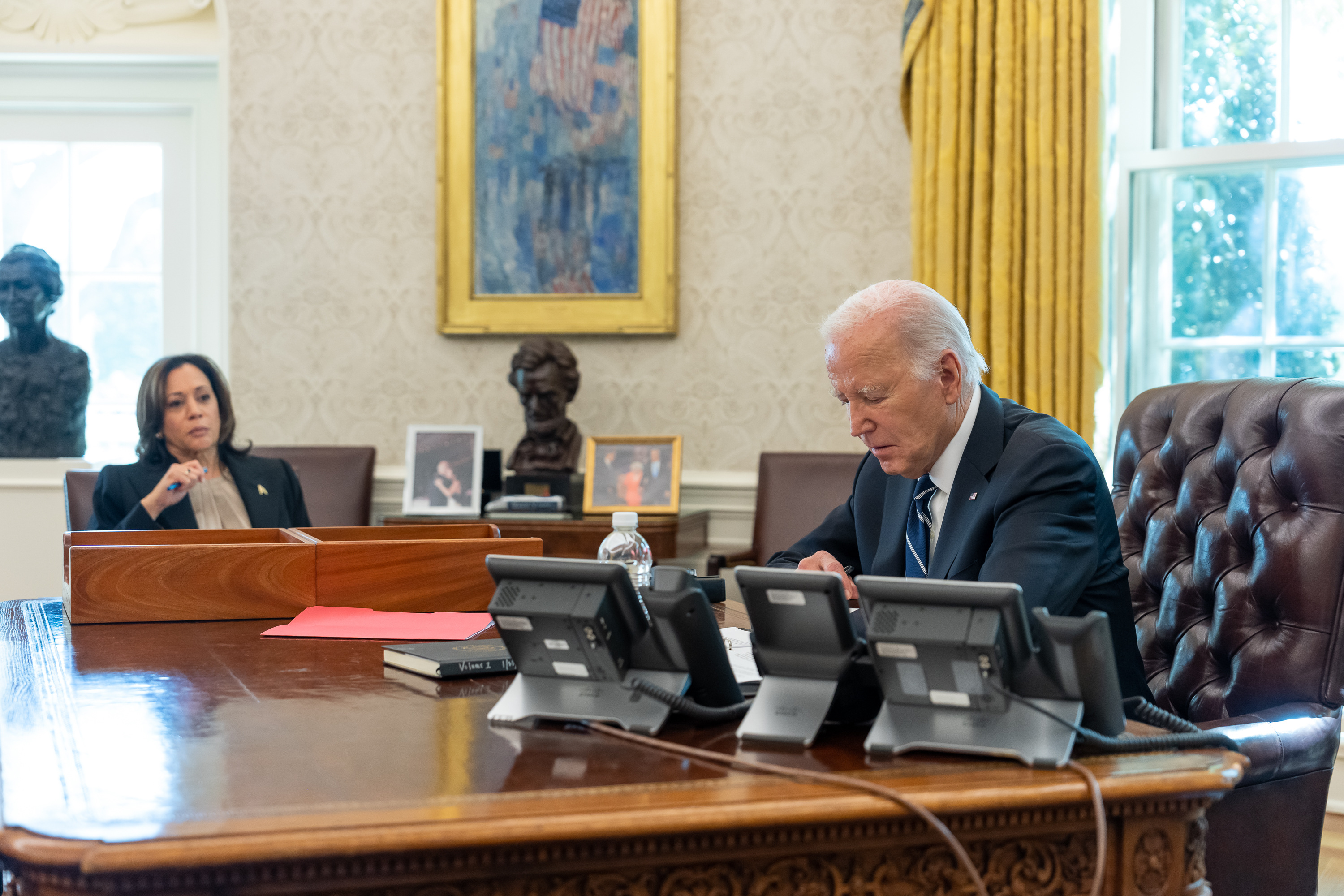 US President Joe Biden speaks on the phone with Israel’s Prime Minister Benjamin Netanyahu as Vice President Kamala Harris watches on at the White House in Washington, DC, on October 10, 2023.