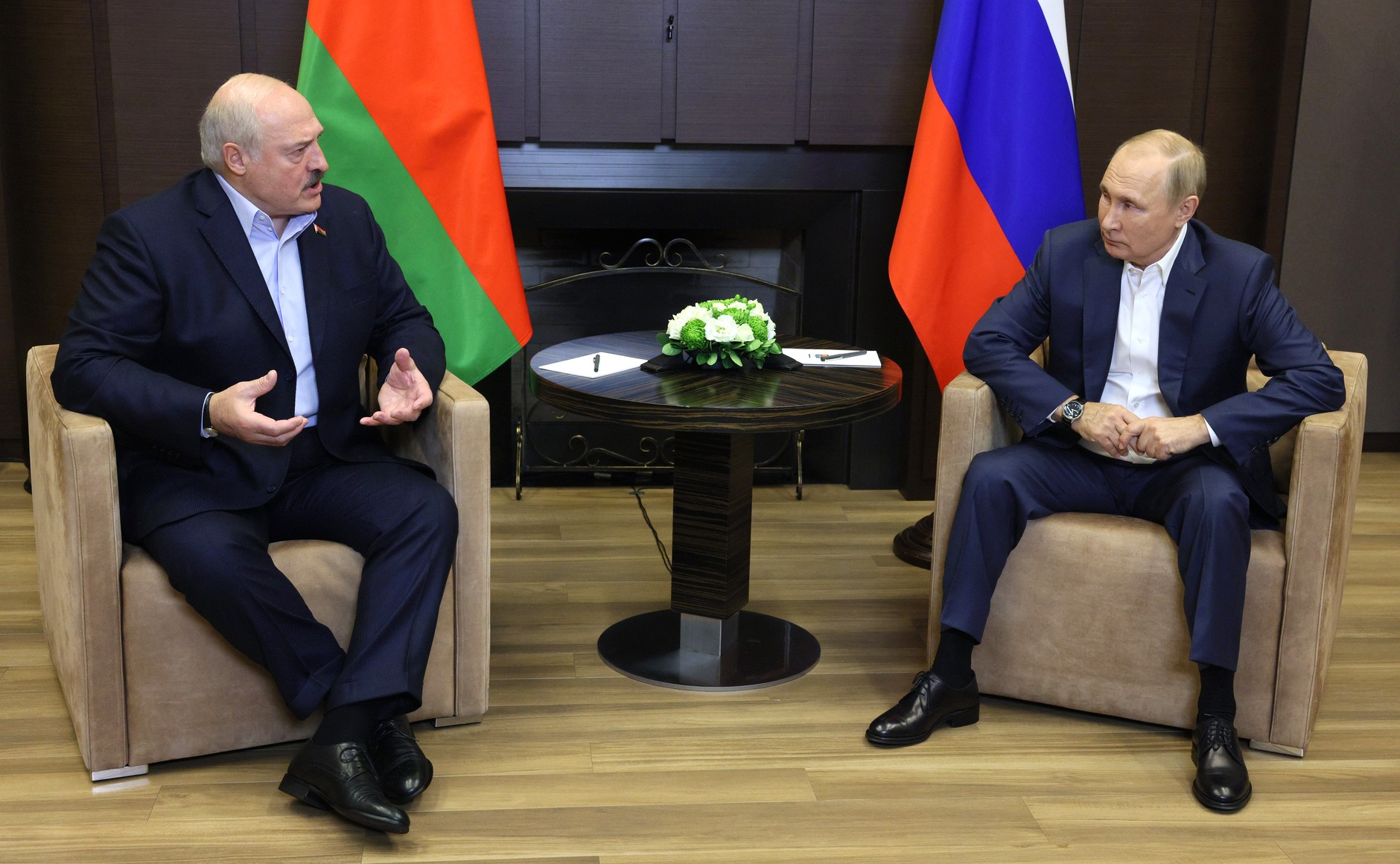 Belarus President Alexander Lukashenko, left, meets with his Russian counterpart Putin in Sochi, Russia, on September 26.