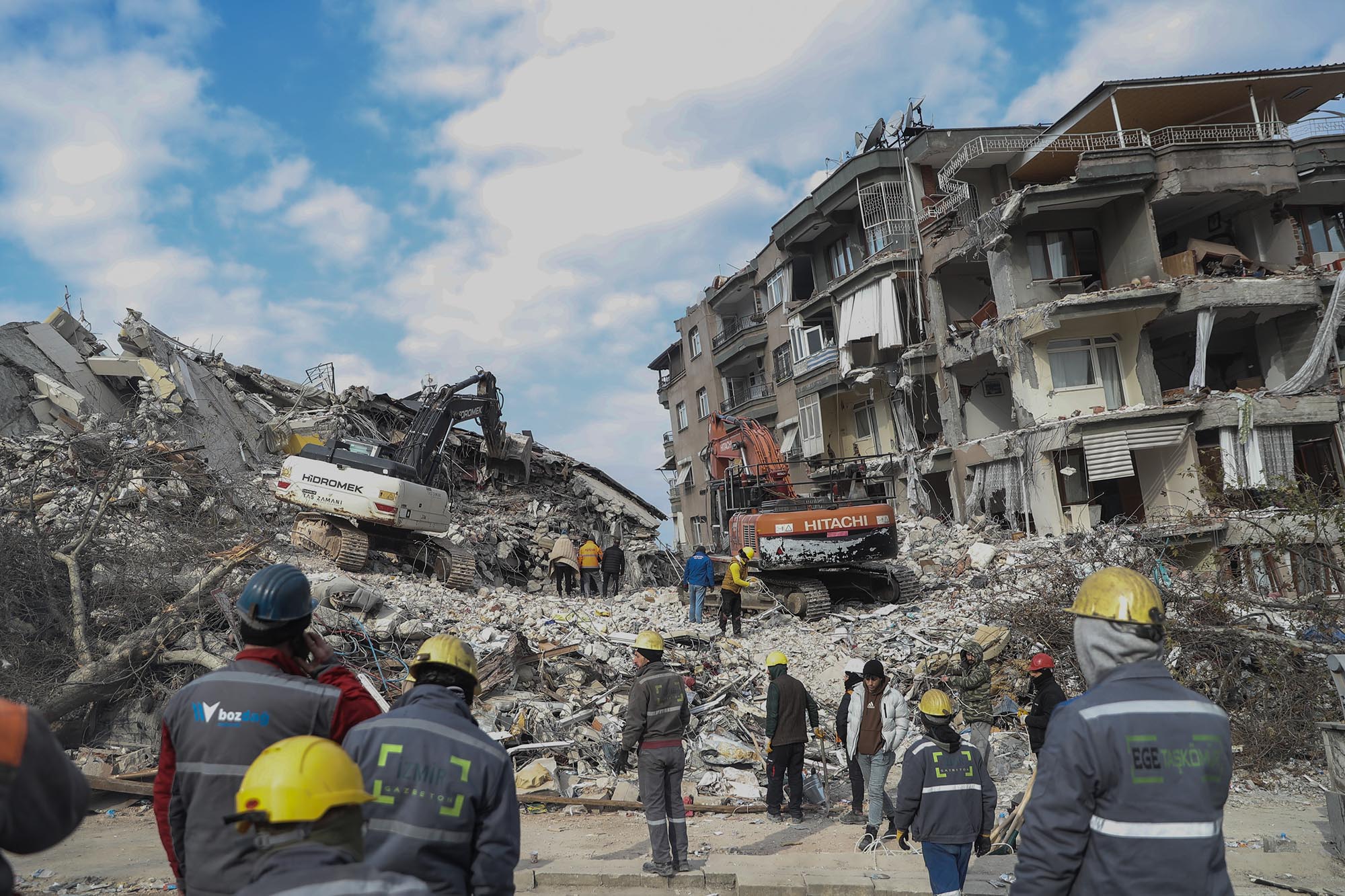 Heavy machinery works on the debris of a collapsed building in Hatay, Turkey, on February 11.