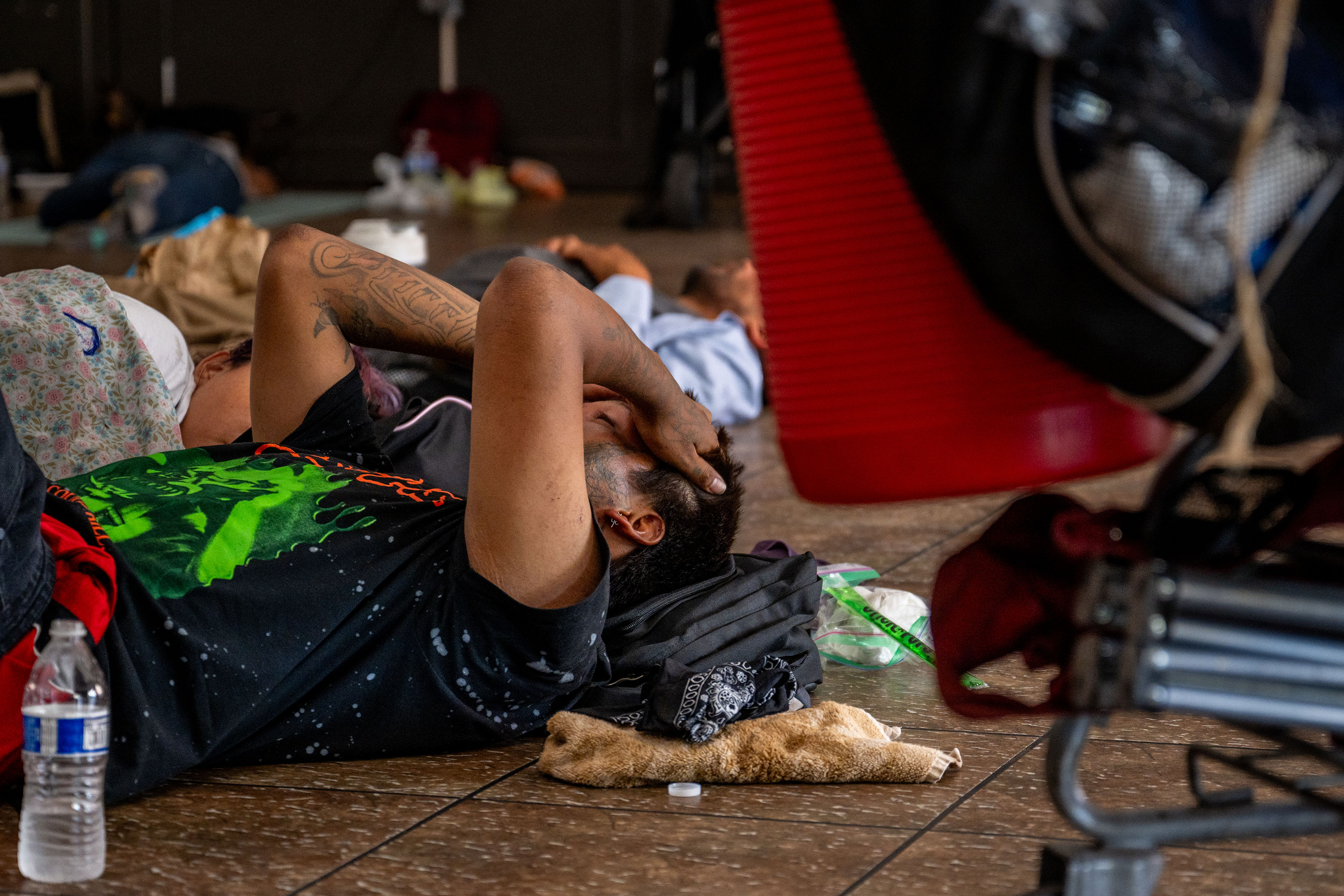 People seeking shelter from the heat rest at a cooling center in Phoenix on July 14.