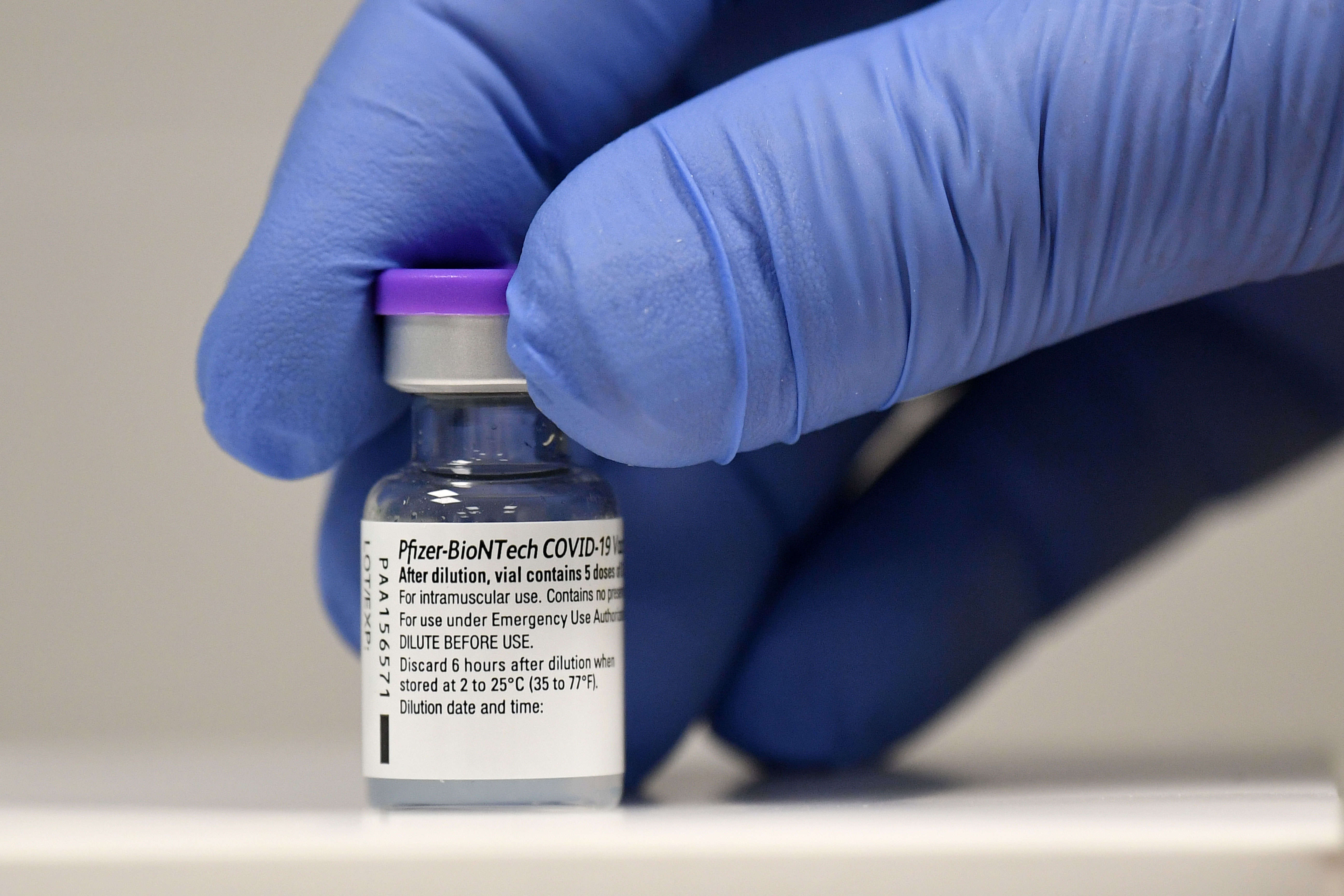 A phial of the Pfizer-BioNTech Covid-19 vaccine is pictured on December 8 in Cardiff, Wales.
