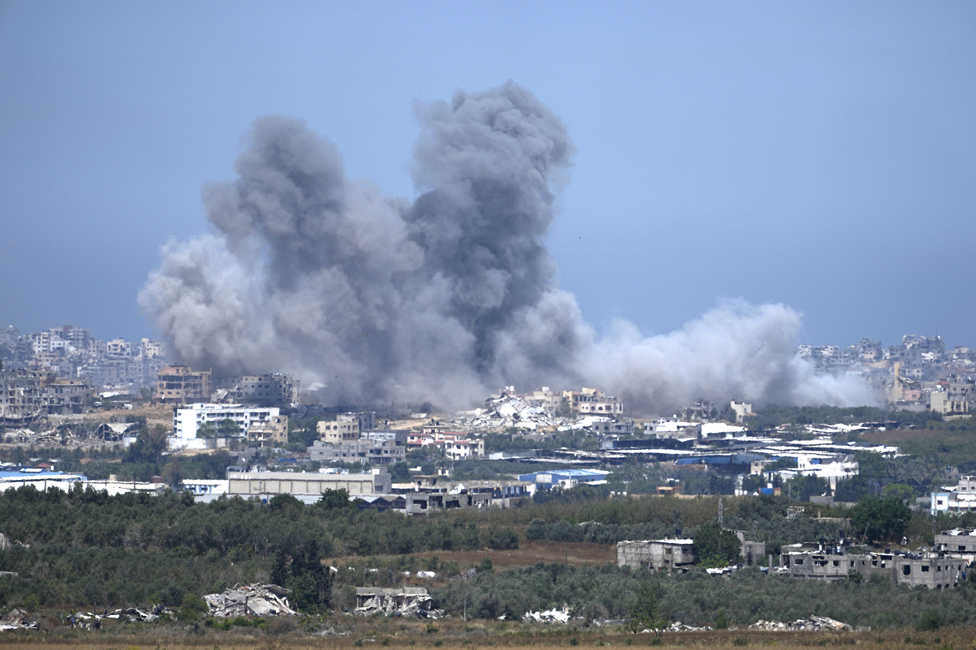 Smoke rises following an Israeli airstrike in Gaza, as seen from southern Israel, on May 17.