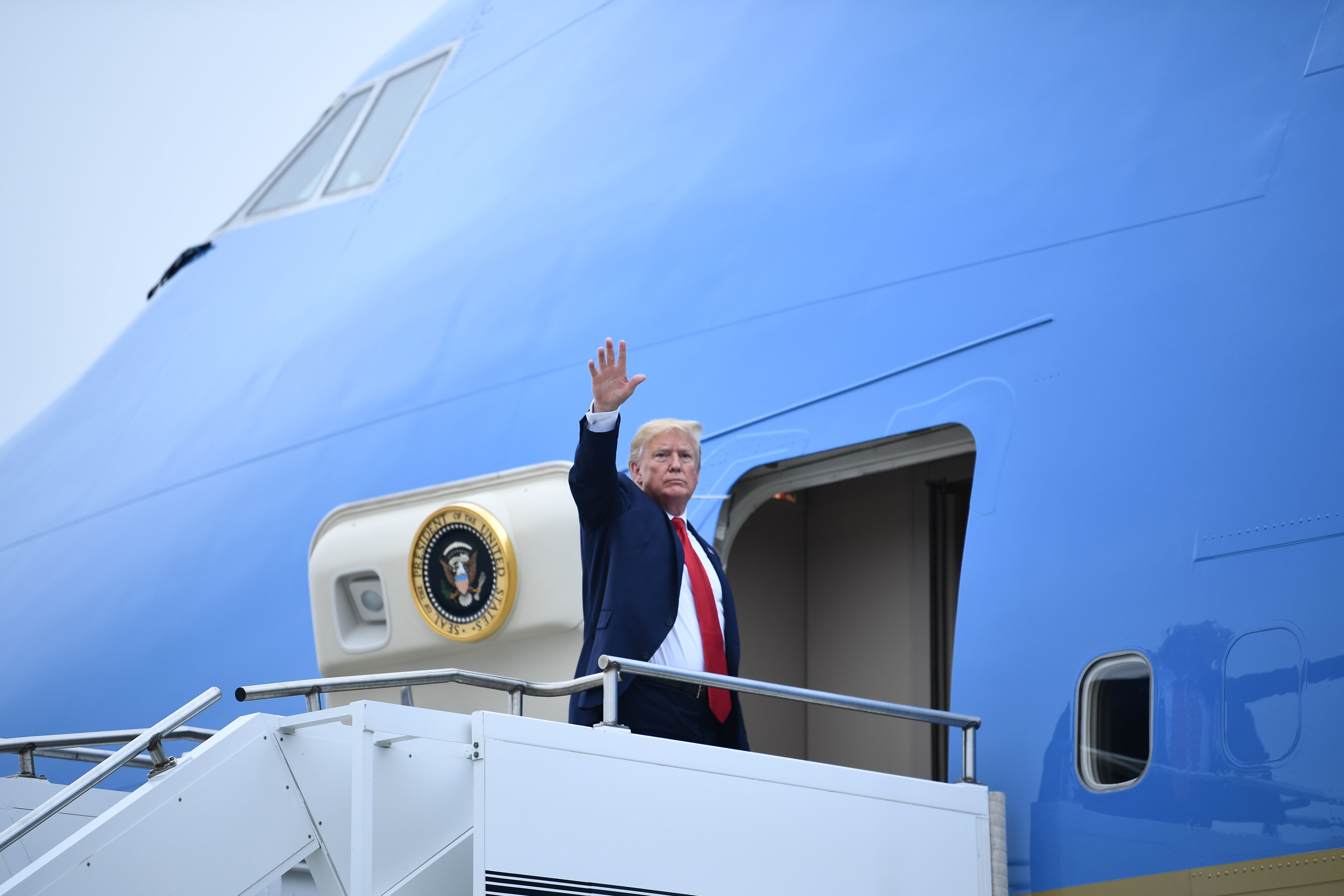 US President Donald Trump boards Air Force One to depart South Korea in Osan Air Base.
