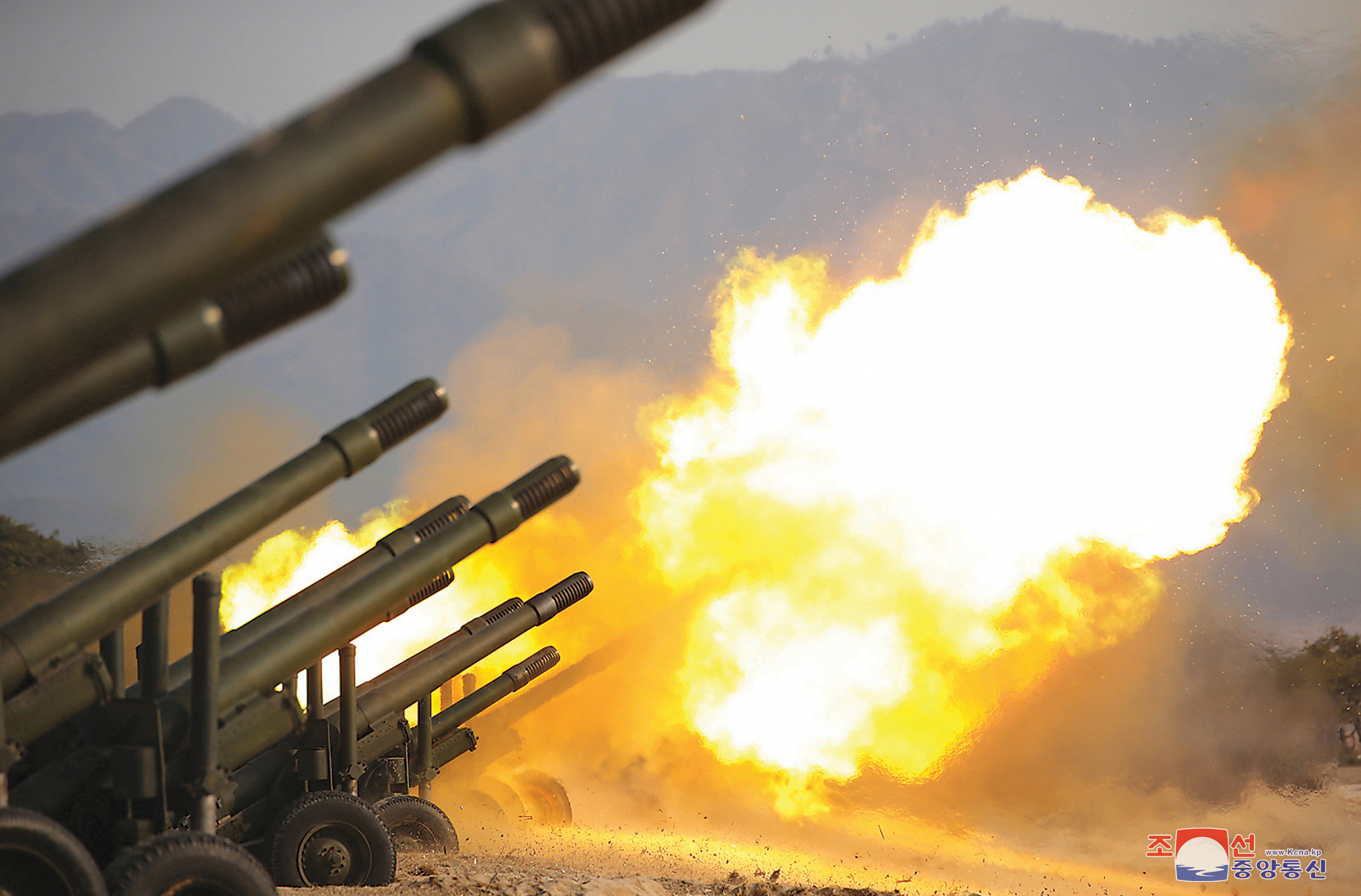 An artillery fire competition between the artillery units under the Korean People's Army Corps 7 and Corps 9 takes place at a training ground in North Korea on March 12, 2020.