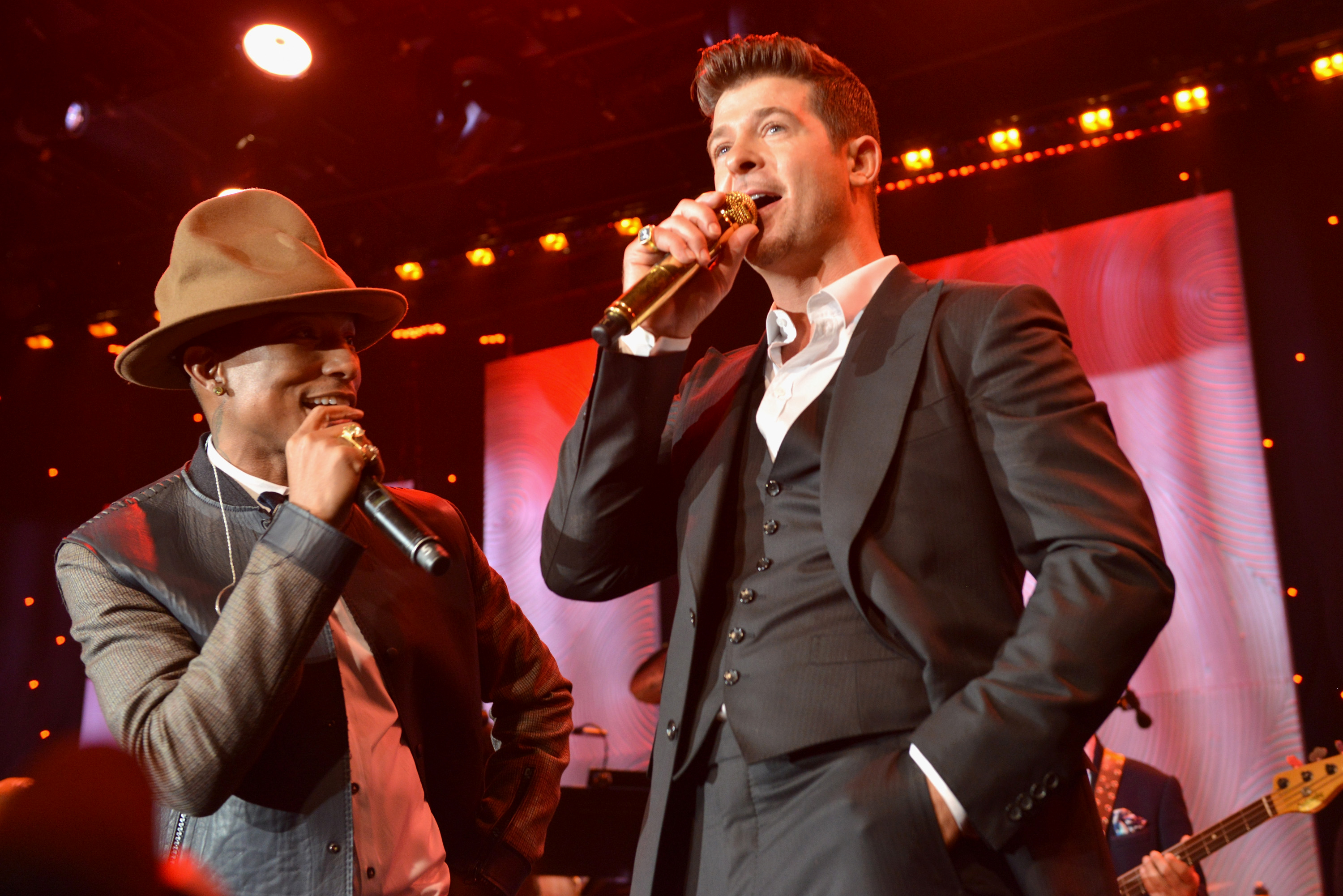 Pharrell Williams and Robin Thicke perform in 2014. 