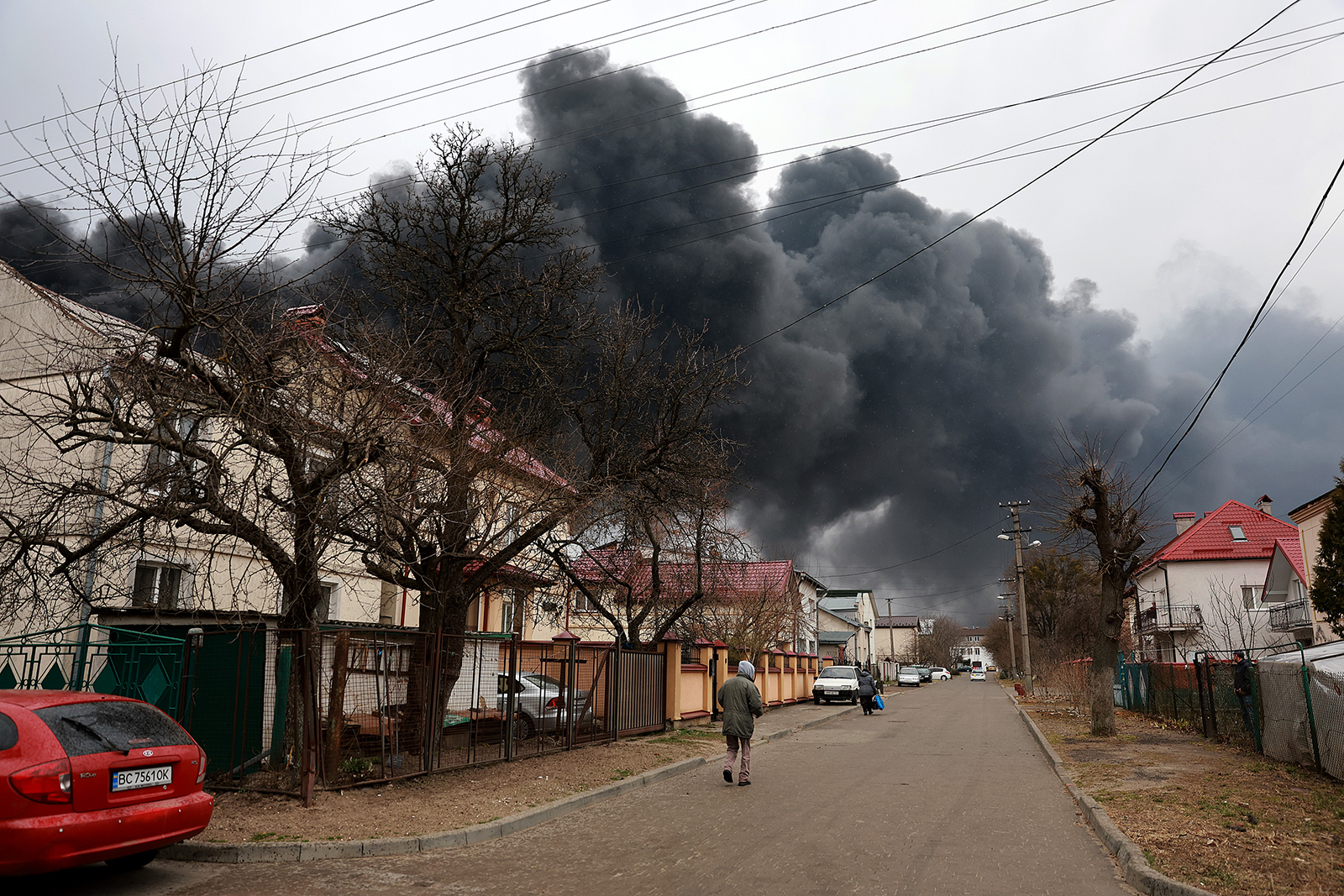 Smoke billows from an industrial facility after a Russian military attack in the area on March 26, in Lviv, Ukraine. 