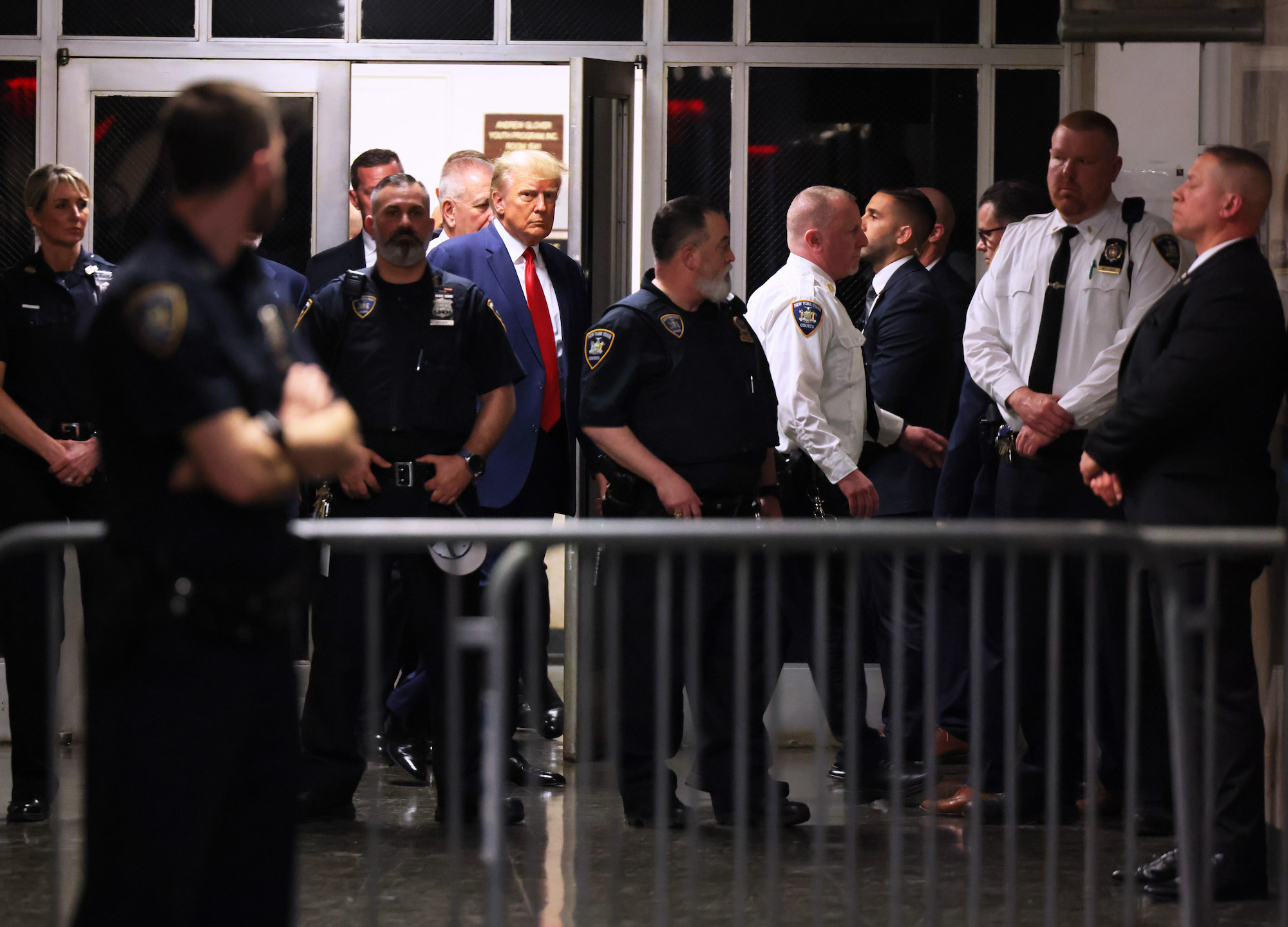 Former President Donald Trump arrives for his arraignment at the Manhattan Criminal Court on Tuesday.