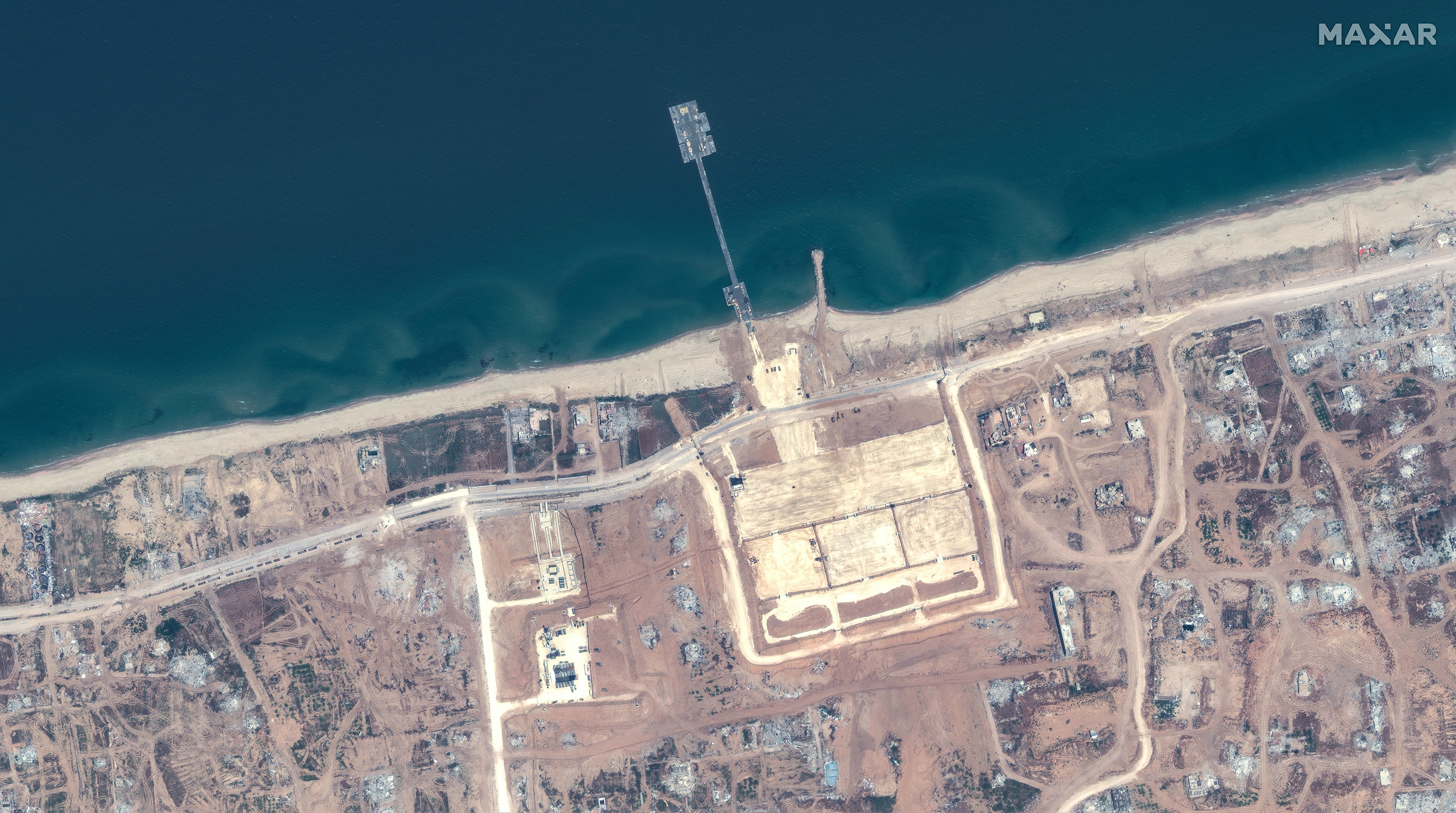A satellite image from Maxar shows Trident Pier on the Gaza shoreline on May 18.
