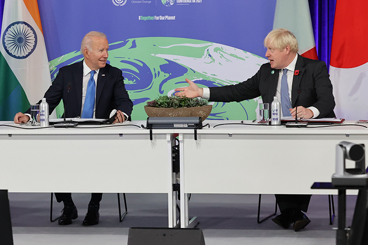 President Joe Biden and British Prime Minister Boris Johnson attend a meeting on "Build Back Better World (B3W)", as part of the World Leaders' Summit of COP26 on November 02, 2021 in Glasgow. 