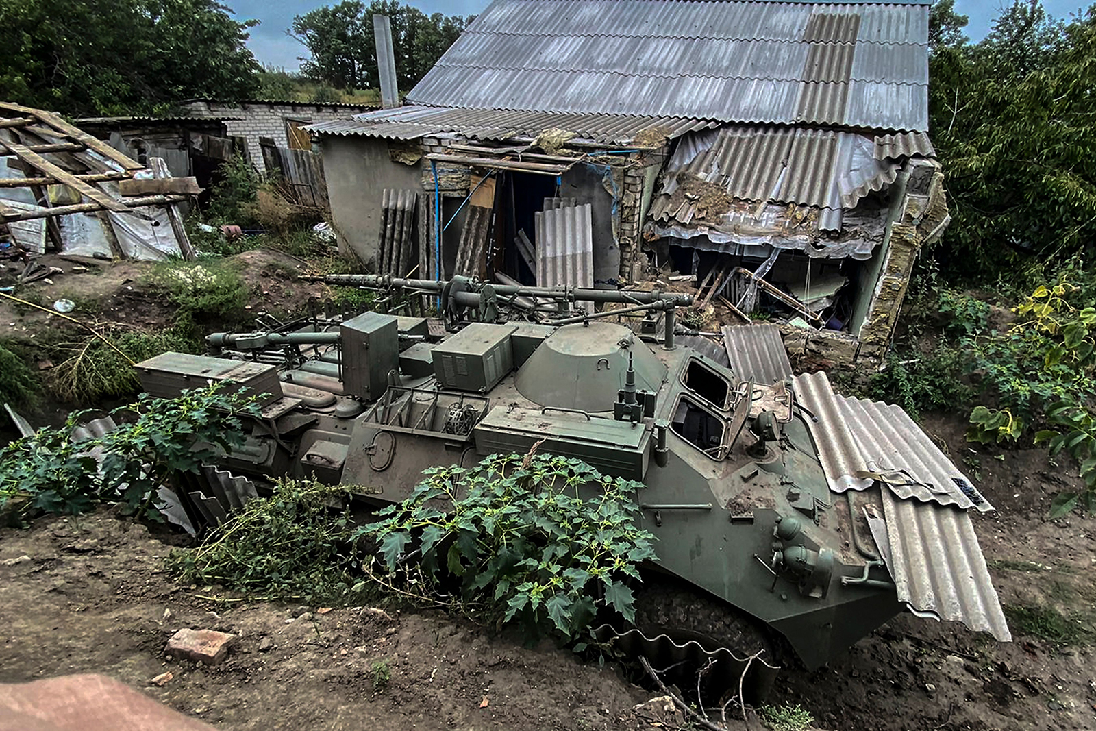 An abandoned Russian armoured vehicle is seen near a village on the outskirts of Izyum on September 11.