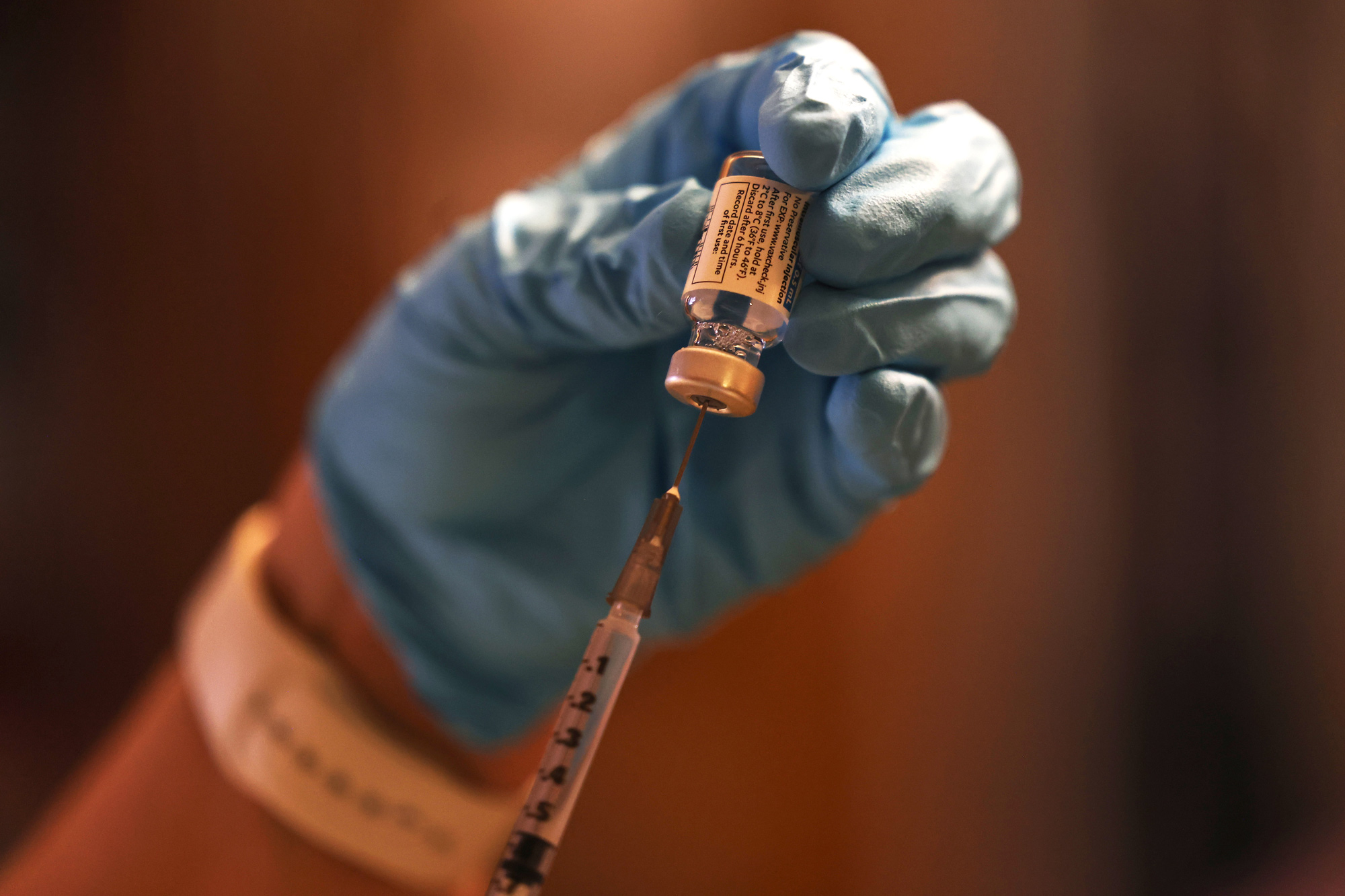 A dose of the Johnson & Johnson coronavirus vaccine is prepared on April 7 in New York City. 