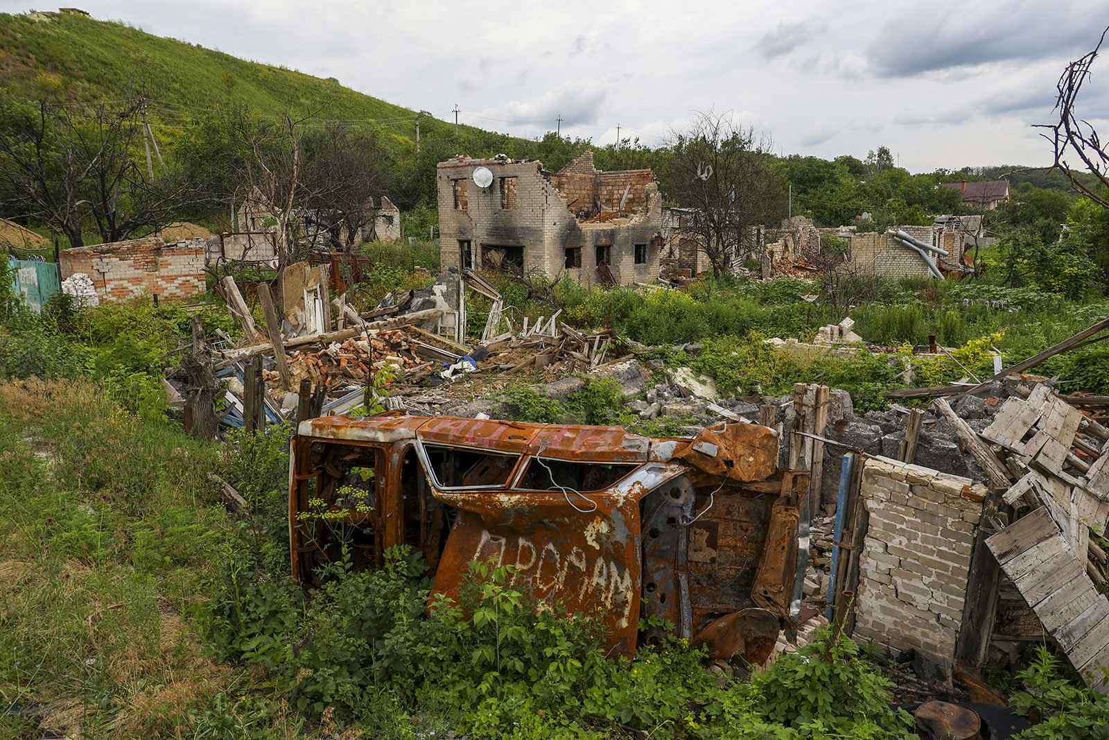 A residential building destroyed during the bombardment by Russian aircraft in the village of Kupyansk-Vuzlovyi, Ukraine on June 28. 