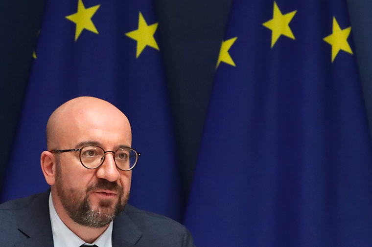 European Council President Charles Michel speaks with EU leaders, via videoconference link, during a EU summit at the European Council building in Brussels, Thursday, March 25. 